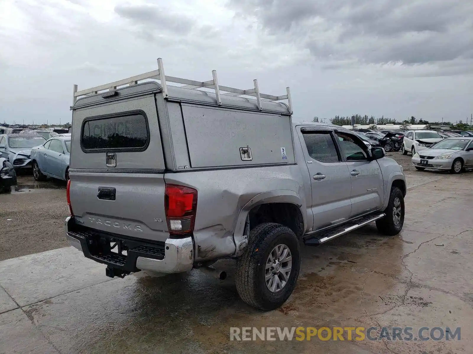 4 Photograph of a damaged car 3TMAZ5CN7KM091394 TOYOTA TACOMA 2019