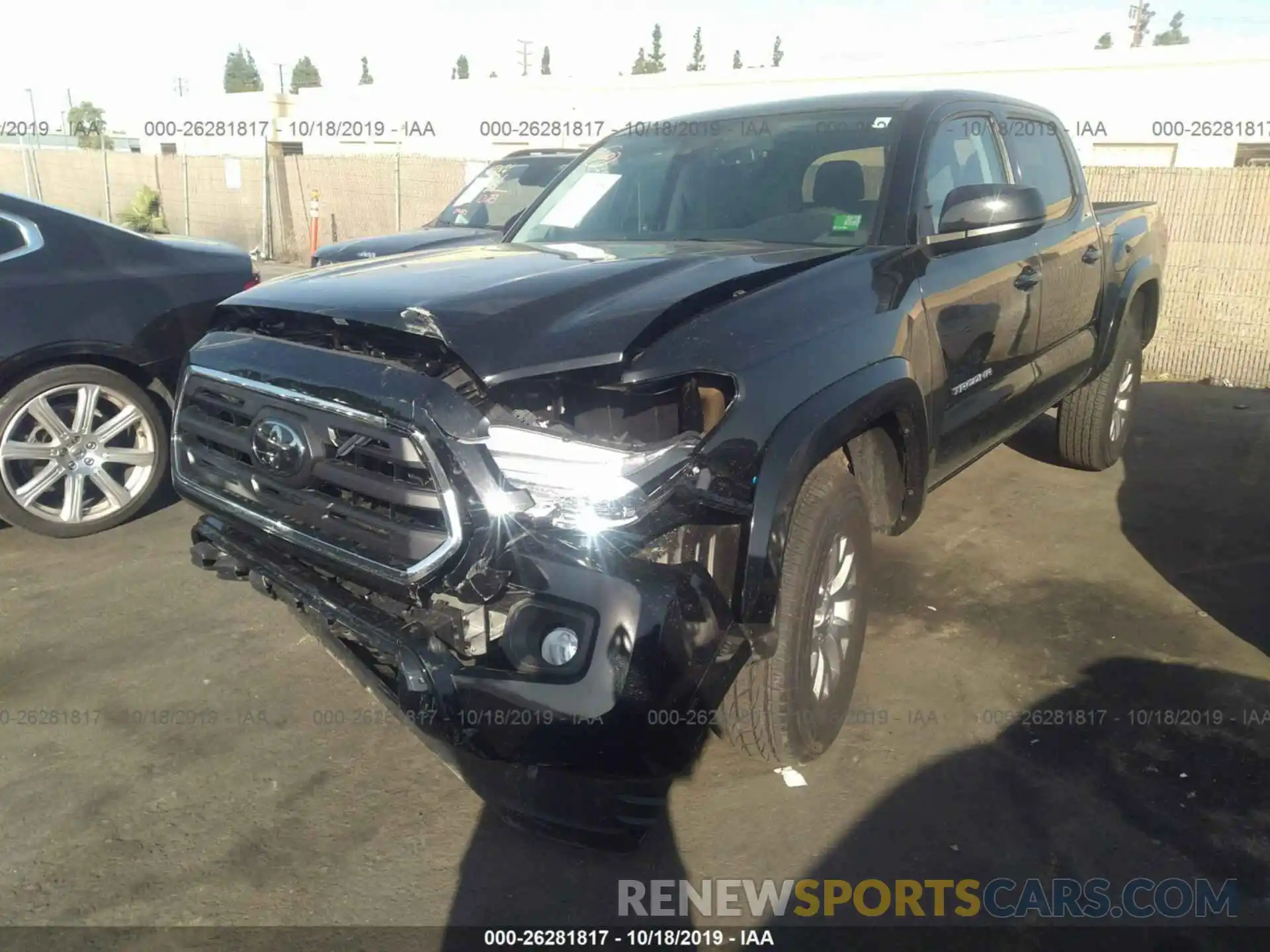 2 Photograph of a damaged car 3TMAZ5CN7KM092013 TOYOTA TACOMA 2019