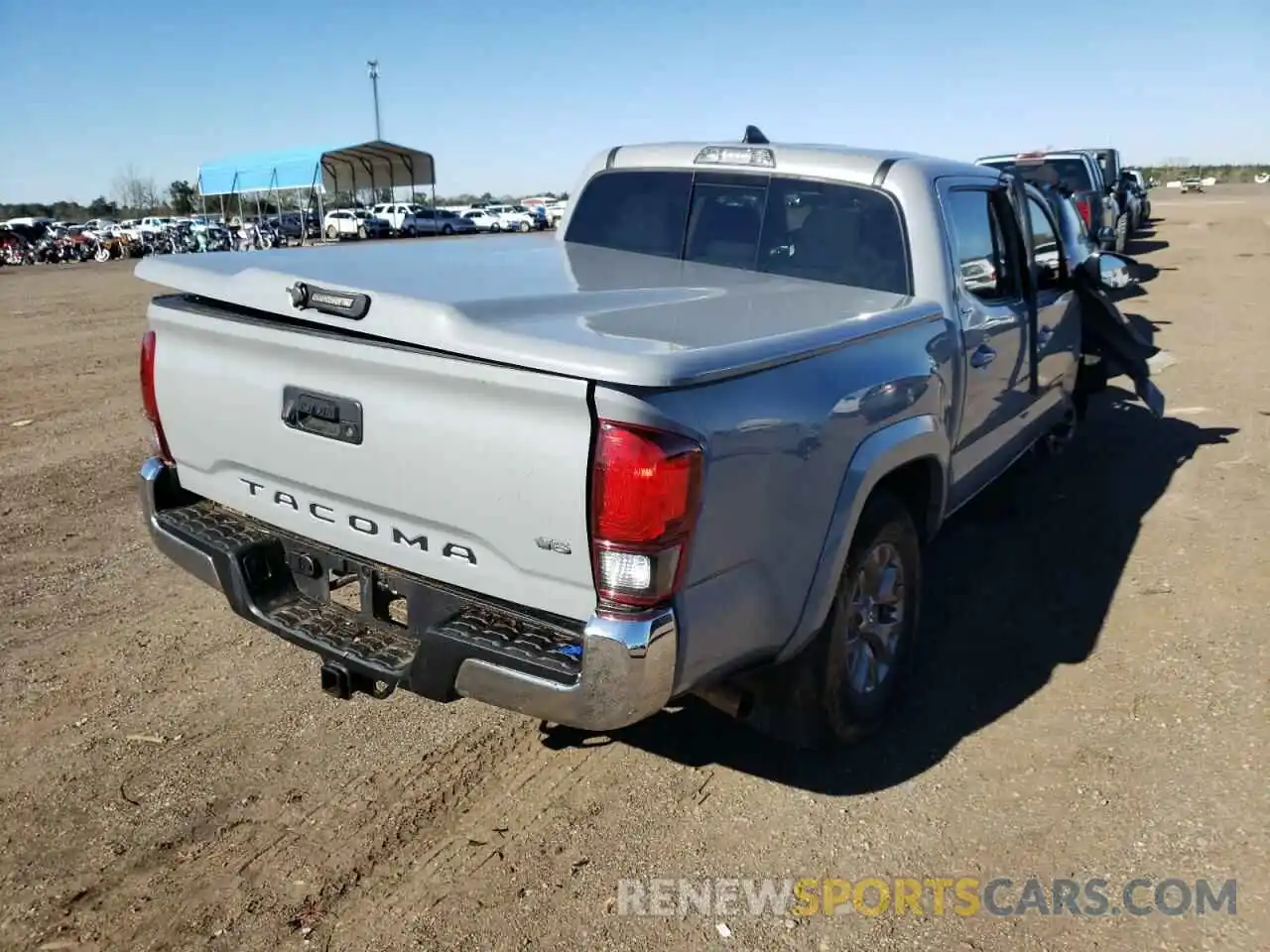 4 Photograph of a damaged car 3TMAZ5CN7KM094201 TOYOTA TACOMA 2019