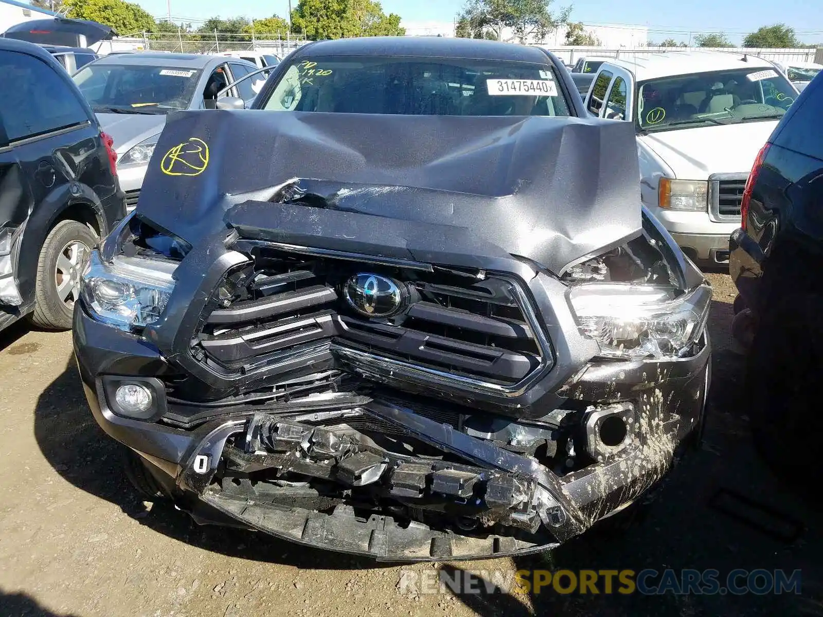 7 Photograph of a damaged car 3TMAZ5CN7KM096501 TOYOTA TACOMA 2019