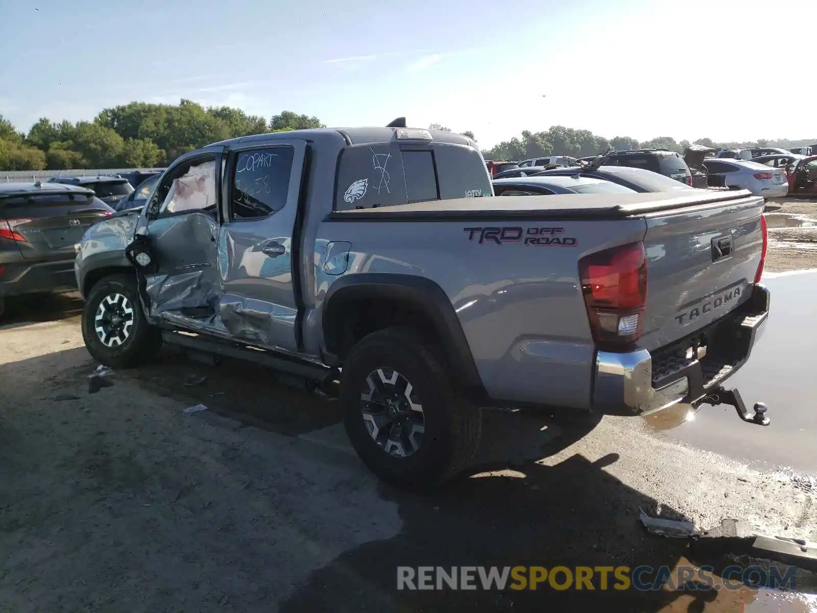 3 Photograph of a damaged car 3TMAZ5CN7KM102975 TOYOTA TACOMA 2019