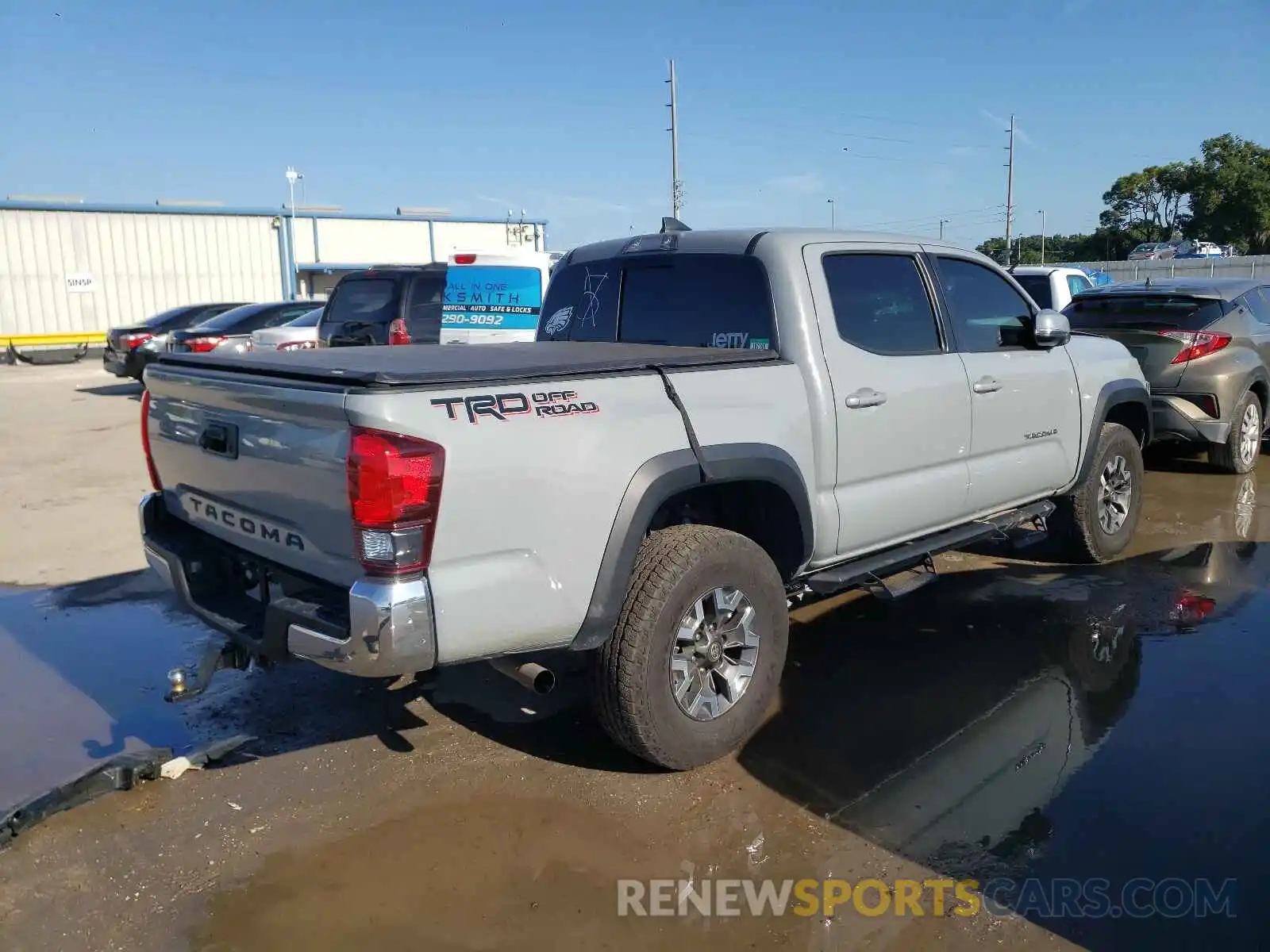 4 Photograph of a damaged car 3TMAZ5CN7KM102975 TOYOTA TACOMA 2019