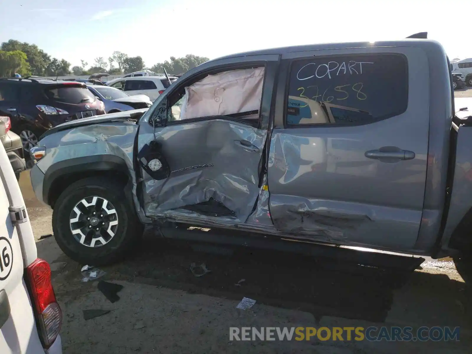 9 Photograph of a damaged car 3TMAZ5CN7KM102975 TOYOTA TACOMA 2019