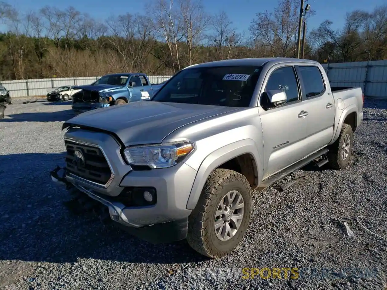 2 Photograph of a damaged car 3TMAZ5CN7KM103012 TOYOTA TACOMA 2019