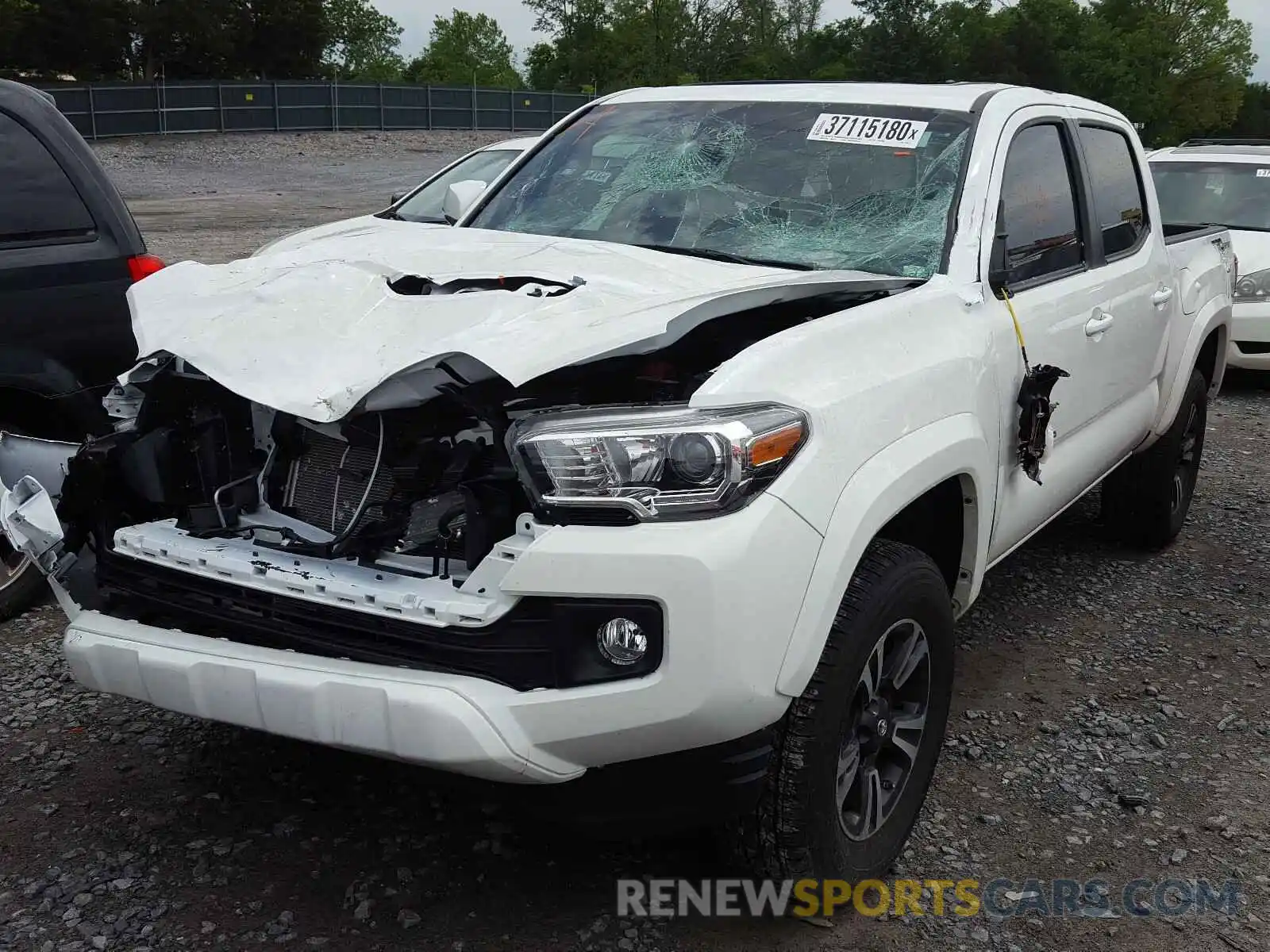 2 Photograph of a damaged car 3TMAZ5CN7KM105813 TOYOTA TACOMA 2019