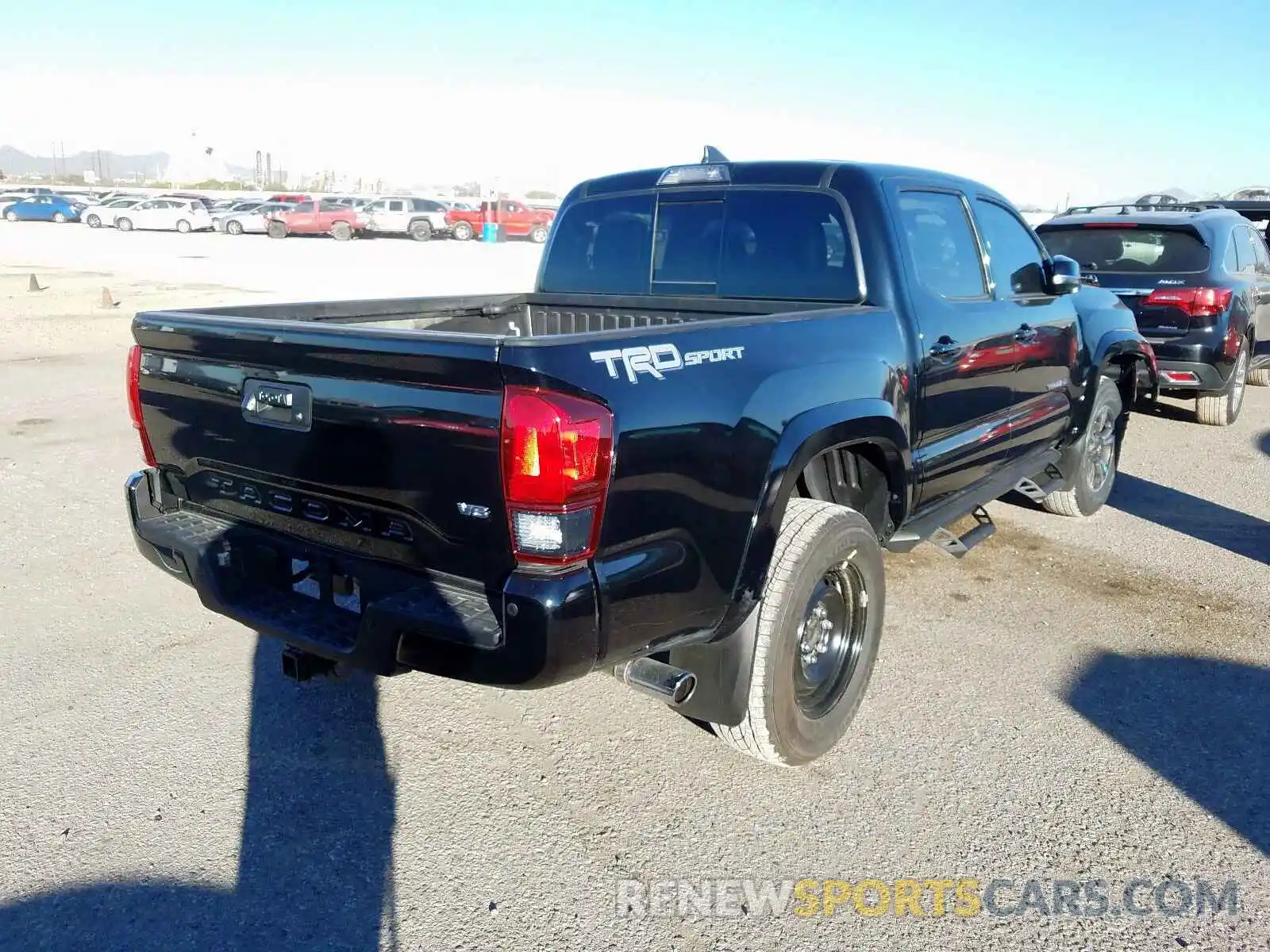 4 Photograph of a damaged car 3TMAZ5CN7KM106993 TOYOTA TACOMA 2019