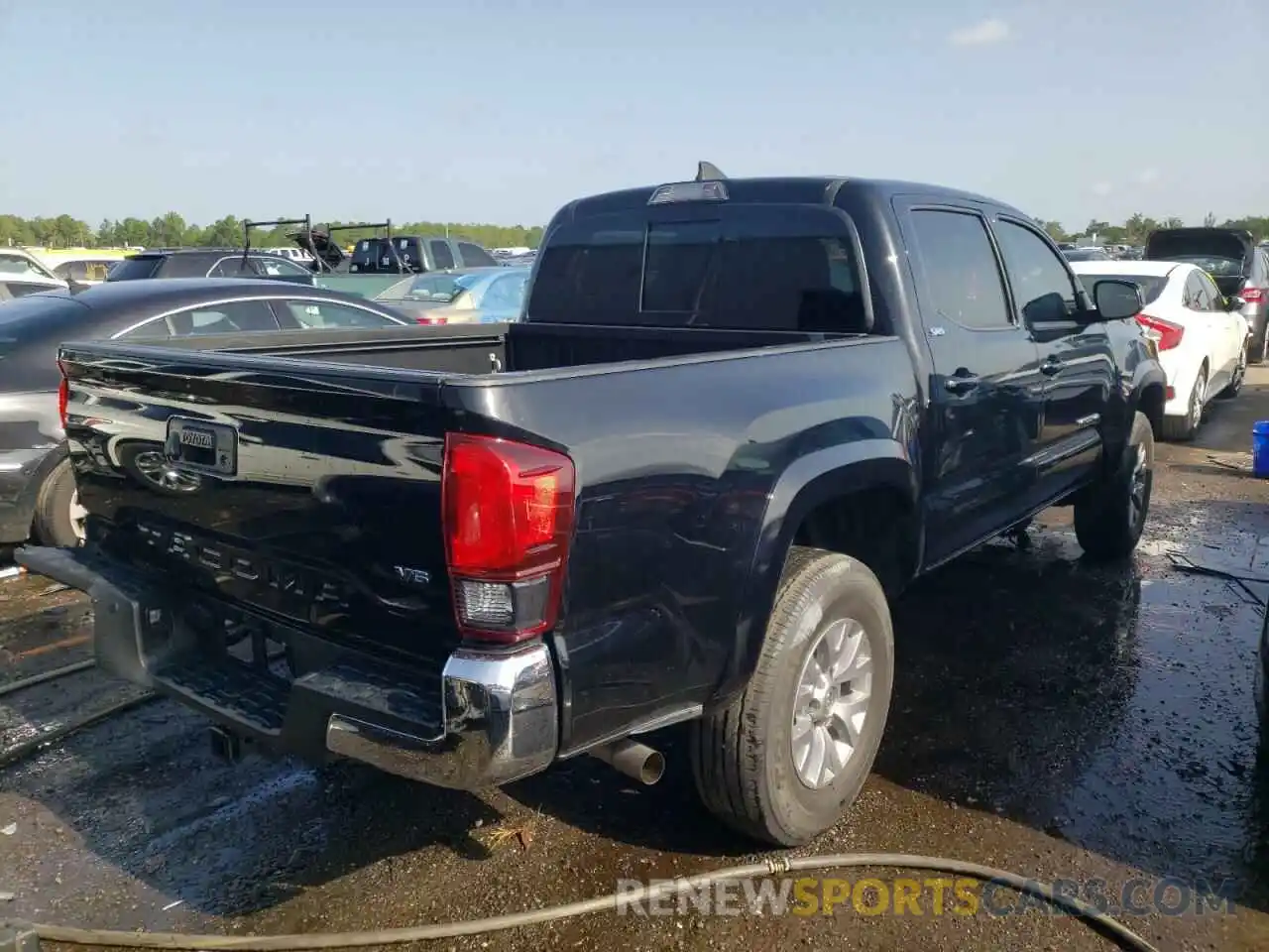 4 Photograph of a damaged car 3TMAZ5CN7KM109859 TOYOTA TACOMA 2019