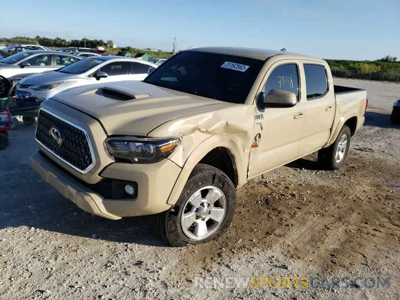 2 Photograph of a damaged car 3TMAZ5CN7KM112874 TOYOTA TACOMA 2019