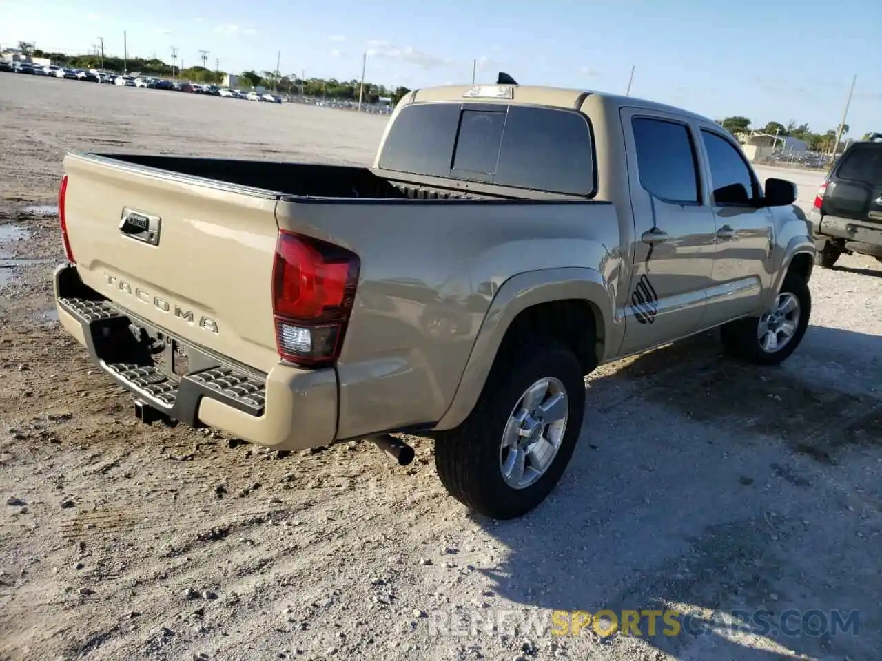 4 Photograph of a damaged car 3TMAZ5CN7KM112874 TOYOTA TACOMA 2019