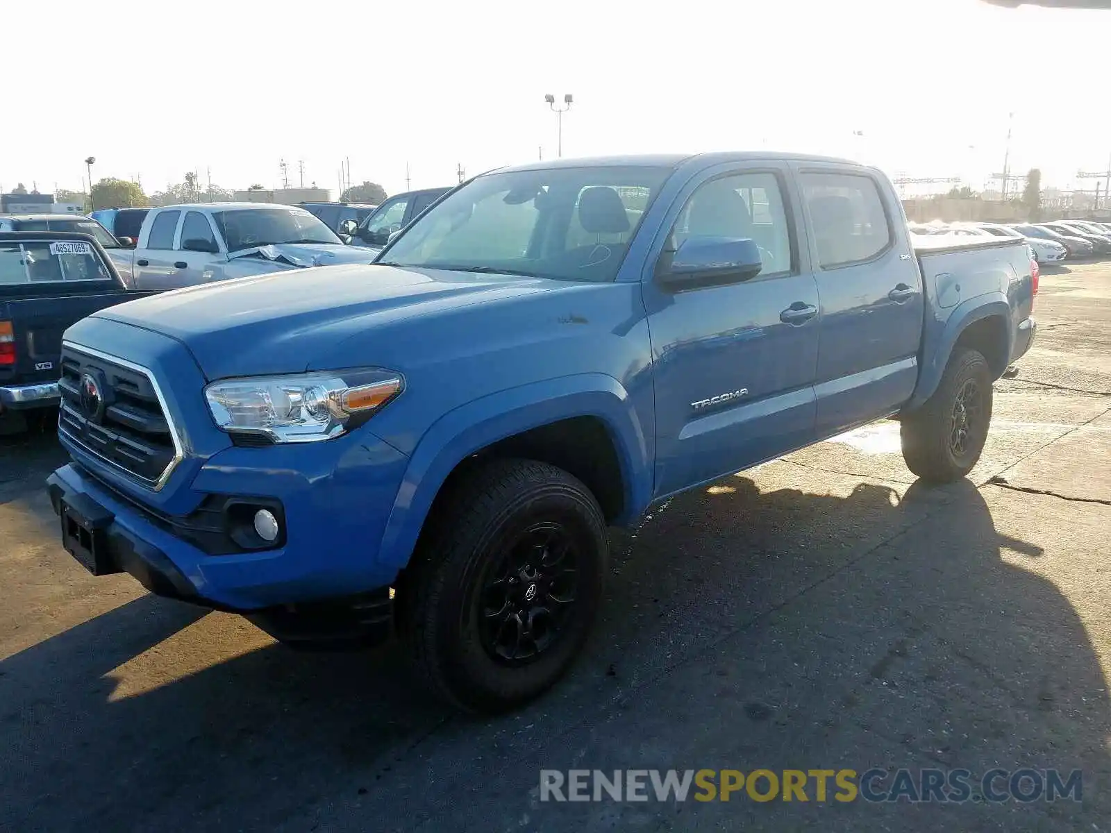 2 Photograph of a damaged car 3TMAZ5CN8KM079514 TOYOTA TACOMA 2019