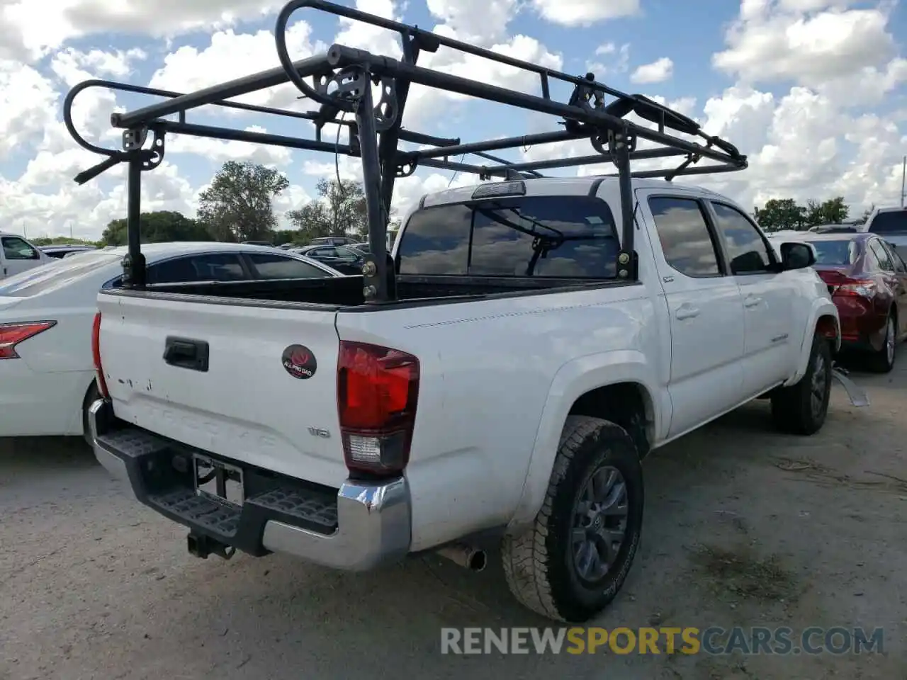 4 Photograph of a damaged car 3TMAZ5CN8KM087855 TOYOTA TACOMA 2019