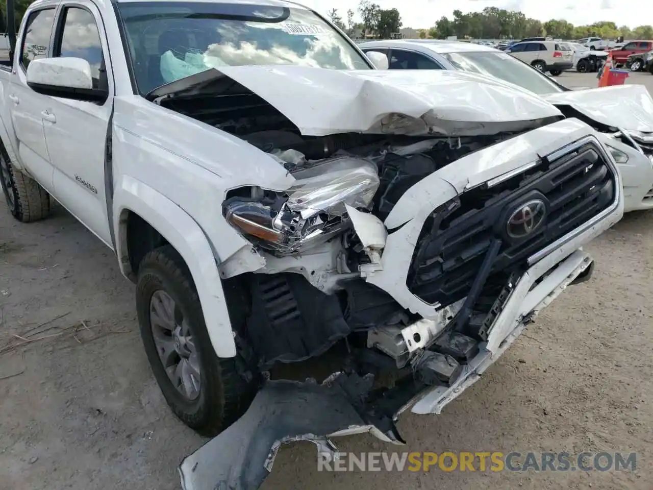 9 Photograph of a damaged car 3TMAZ5CN8KM087855 TOYOTA TACOMA 2019