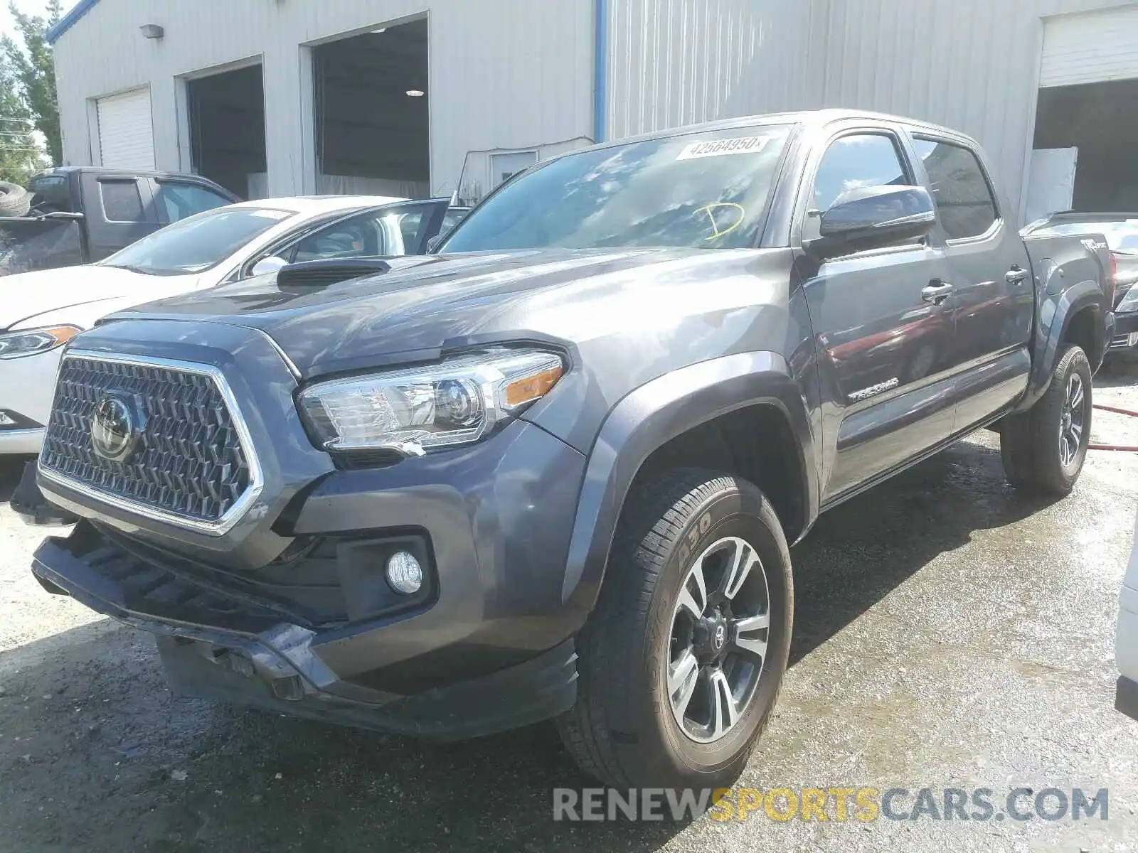 2 Photograph of a damaged car 3TMAZ5CN8KM087886 TOYOTA TACOMA 2019