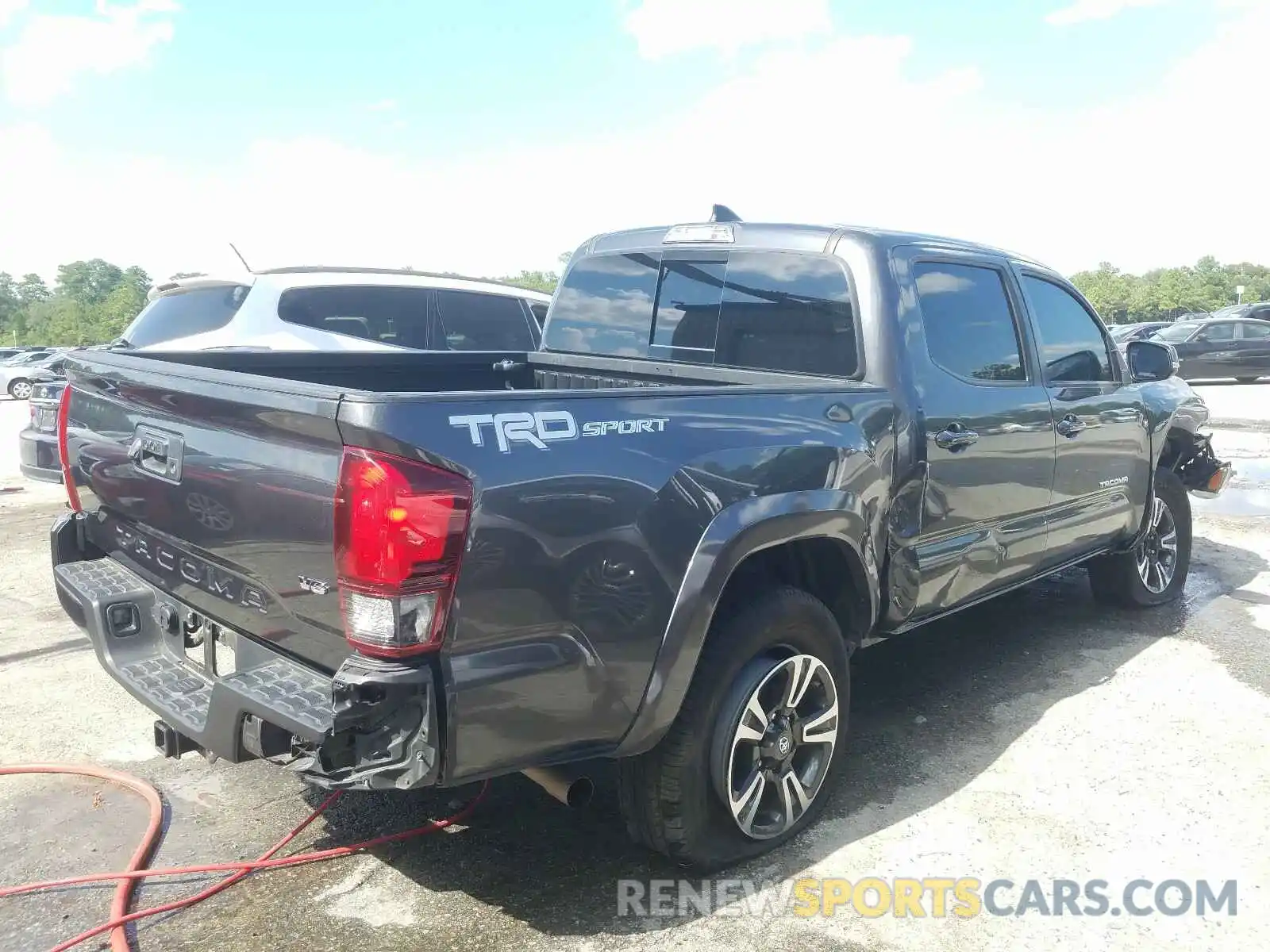 4 Photograph of a damaged car 3TMAZ5CN8KM087886 TOYOTA TACOMA 2019