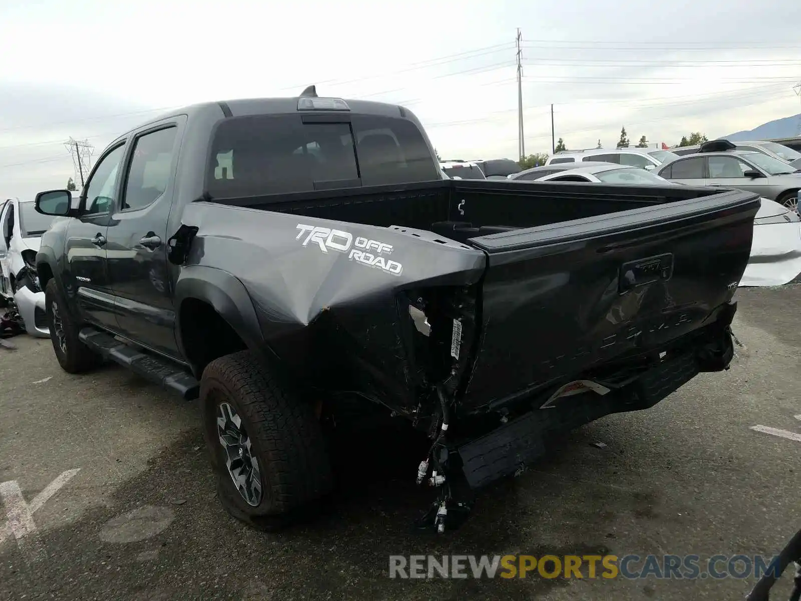 3 Photograph of a damaged car 3TMAZ5CN8KM091355 TOYOTA TACOMA 2019