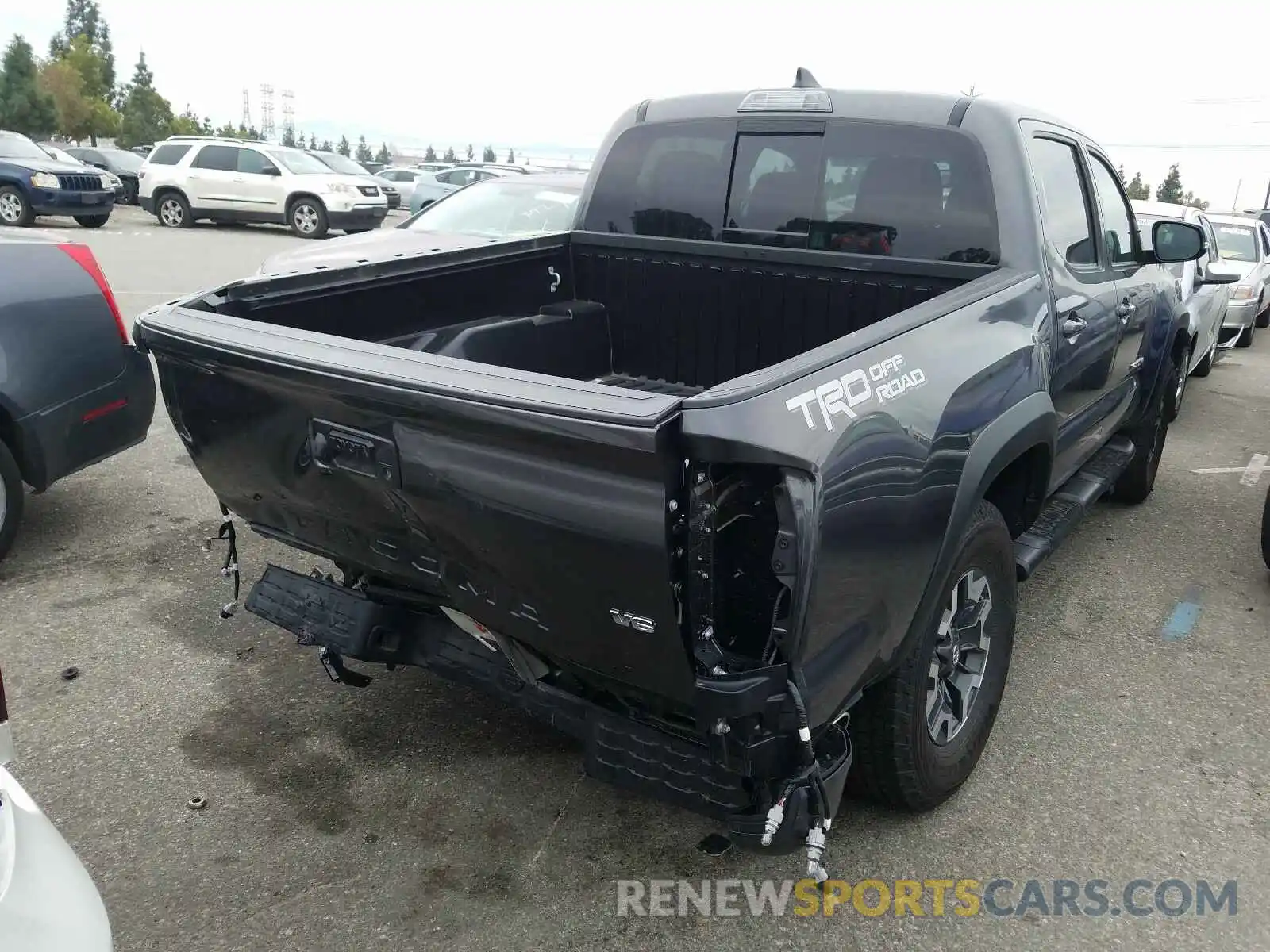 4 Photograph of a damaged car 3TMAZ5CN8KM091355 TOYOTA TACOMA 2019