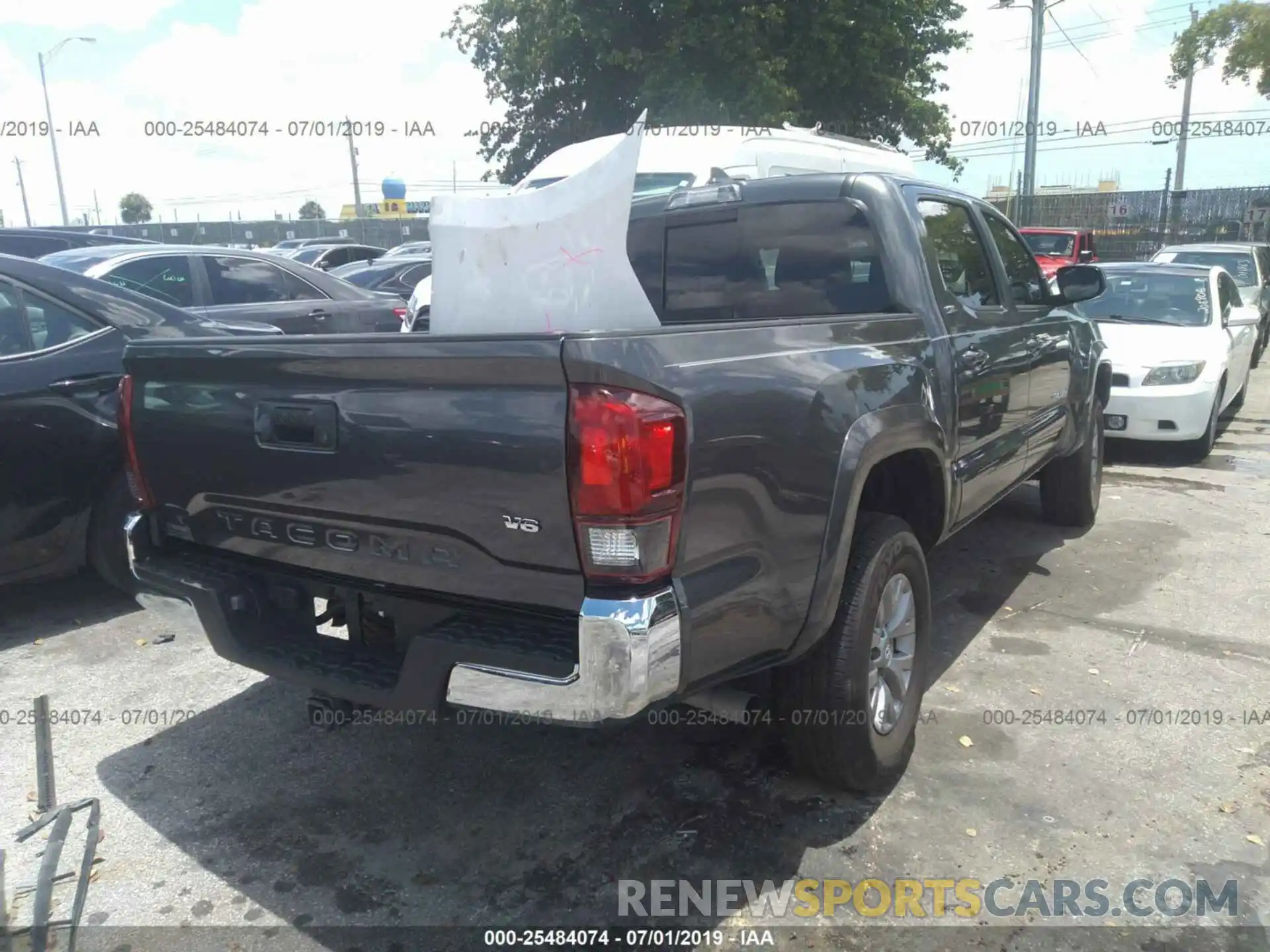 4 Photograph of a damaged car 3TMAZ5CN8KM094126 TOYOTA TACOMA 2019