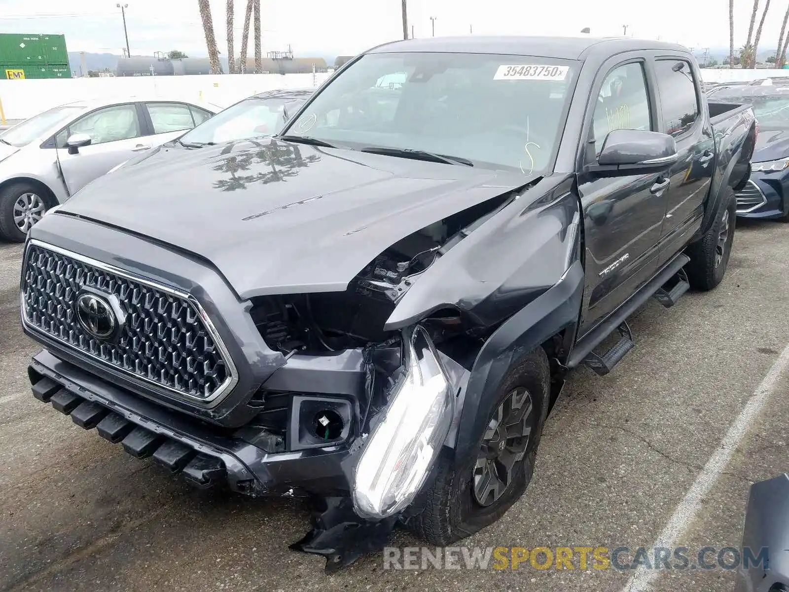 2 Photograph of a damaged car 3TMAZ5CN8KM094627 TOYOTA TACOMA 2019