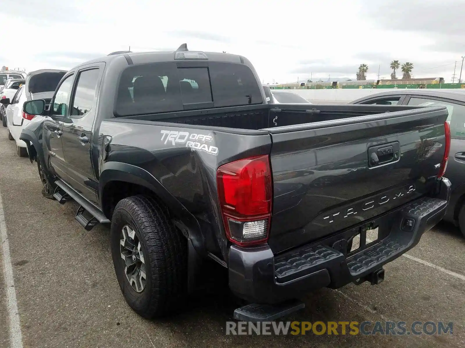 3 Photograph of a damaged car 3TMAZ5CN8KM094627 TOYOTA TACOMA 2019