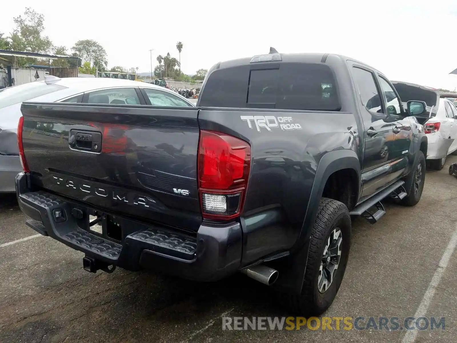 4 Photograph of a damaged car 3TMAZ5CN8KM094627 TOYOTA TACOMA 2019