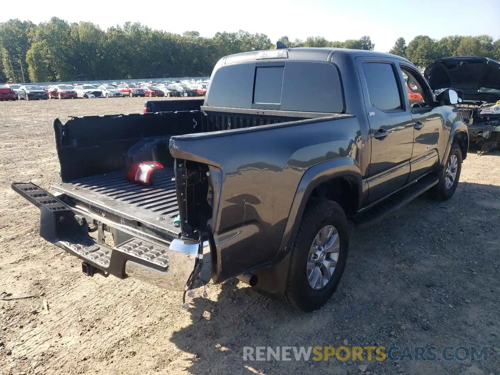 4 Photograph of a damaged car 3TMAZ5CN8KM096068 TOYOTA TACOMA 2019