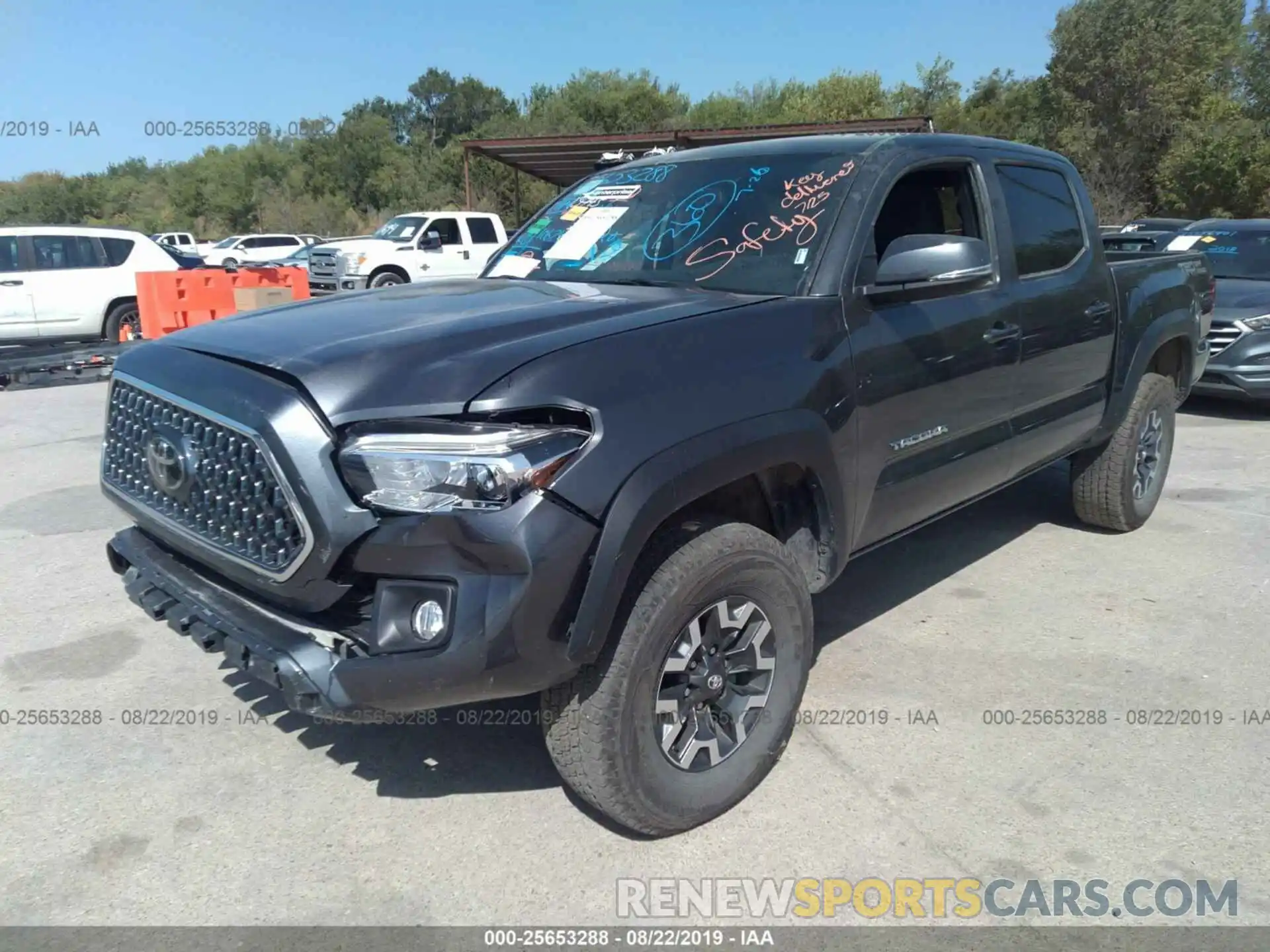 2 Photograph of a damaged car 3TMAZ5CN8KM096801 TOYOTA TACOMA 2019