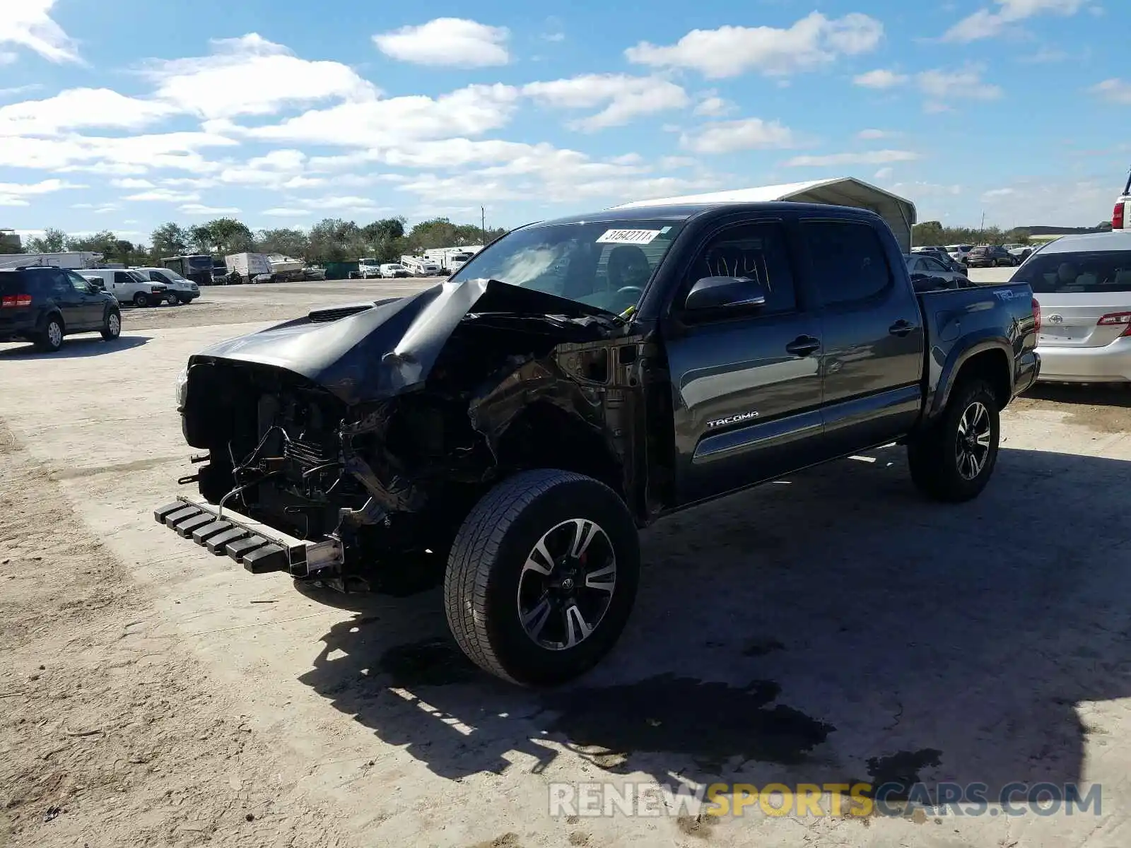 2 Photograph of a damaged car 3TMAZ5CN8KM097849 TOYOTA TACOMA 2019