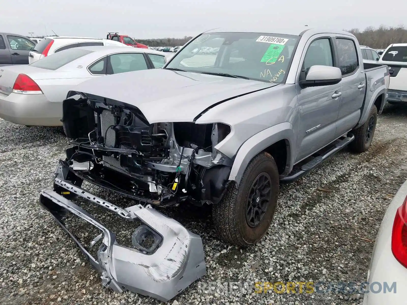 2 Photograph of a damaged car 3TMAZ5CN8KM099326 TOYOTA TACOMA 2019