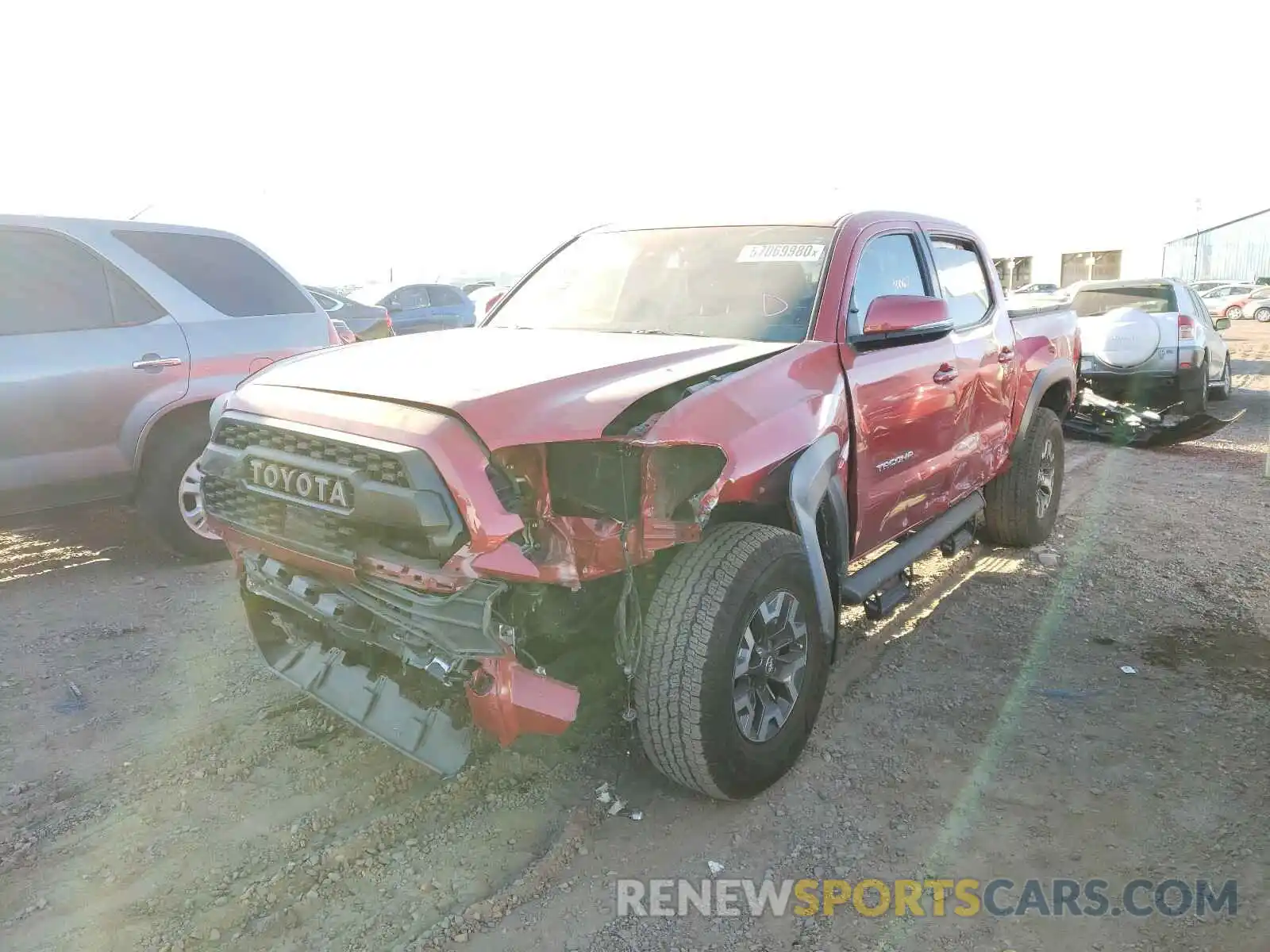 2 Photograph of a damaged car 3TMAZ5CN8KM100278 TOYOTA TACOMA 2019