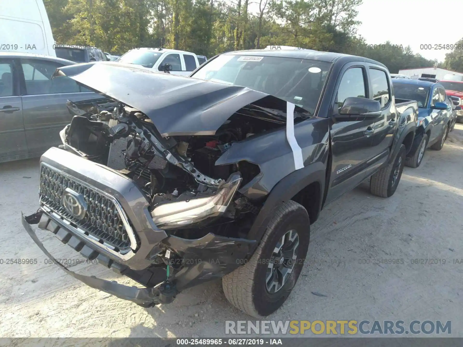 2 Photograph of a damaged car 3TMAZ5CN8KM100300 TOYOTA TACOMA 2019