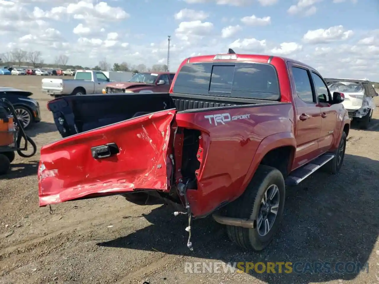 4 Photograph of a damaged car 3TMAZ5CN8KM110549 TOYOTA TACOMA 2019