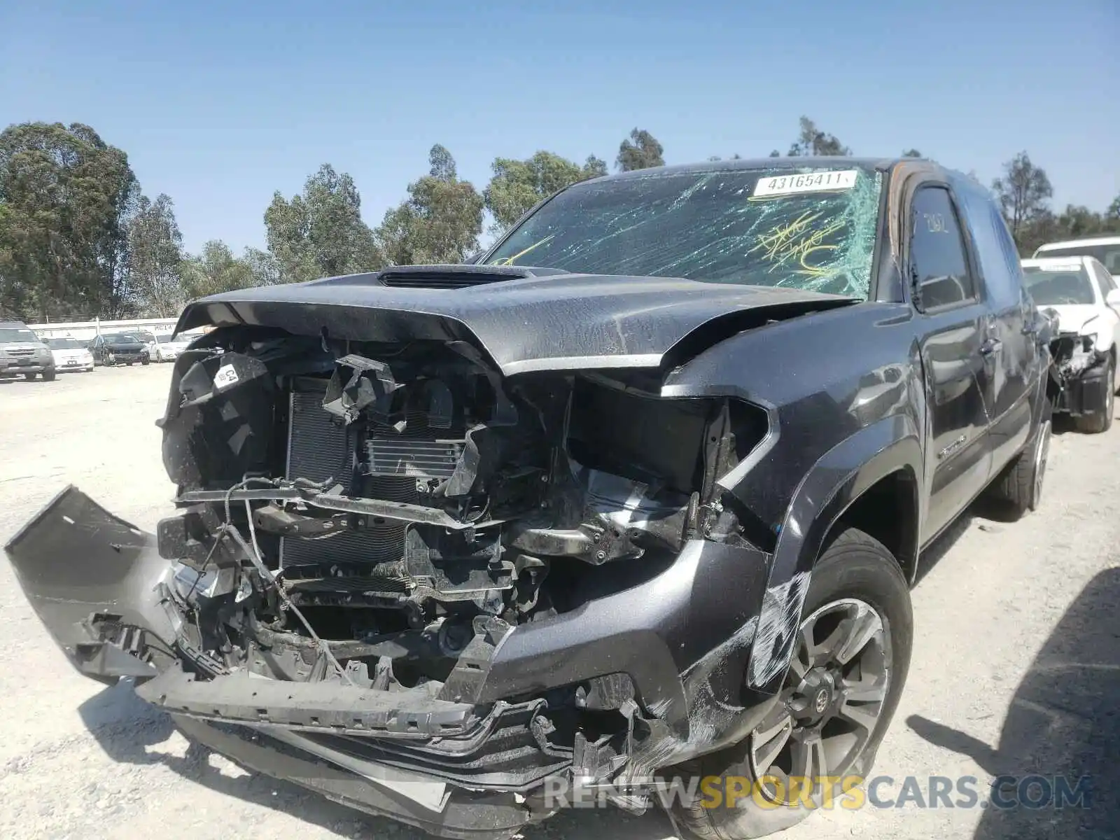 2 Photograph of a damaged car 3TMAZ5CN8KM111538 TOYOTA TACOMA 2019