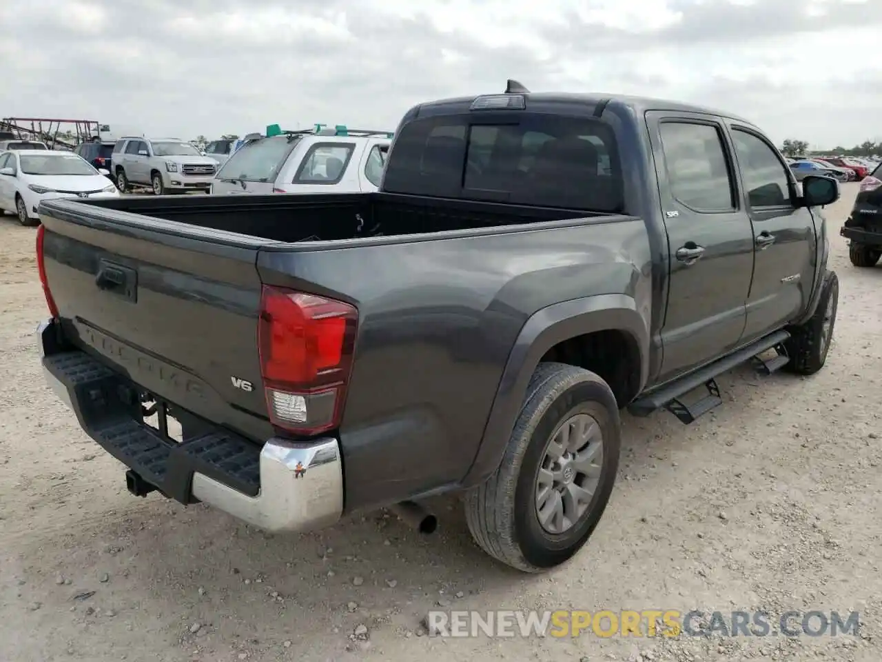 4 Photograph of a damaged car 3TMAZ5CN8KM113242 TOYOTA TACOMA 2019