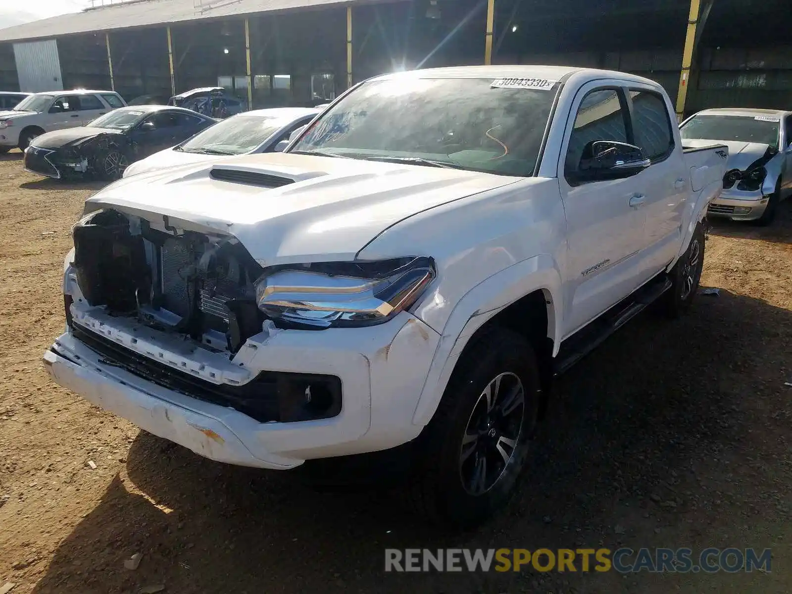 2 Photograph of a damaged car 3TMAZ5CN8KM113323 TOYOTA TACOMA 2019