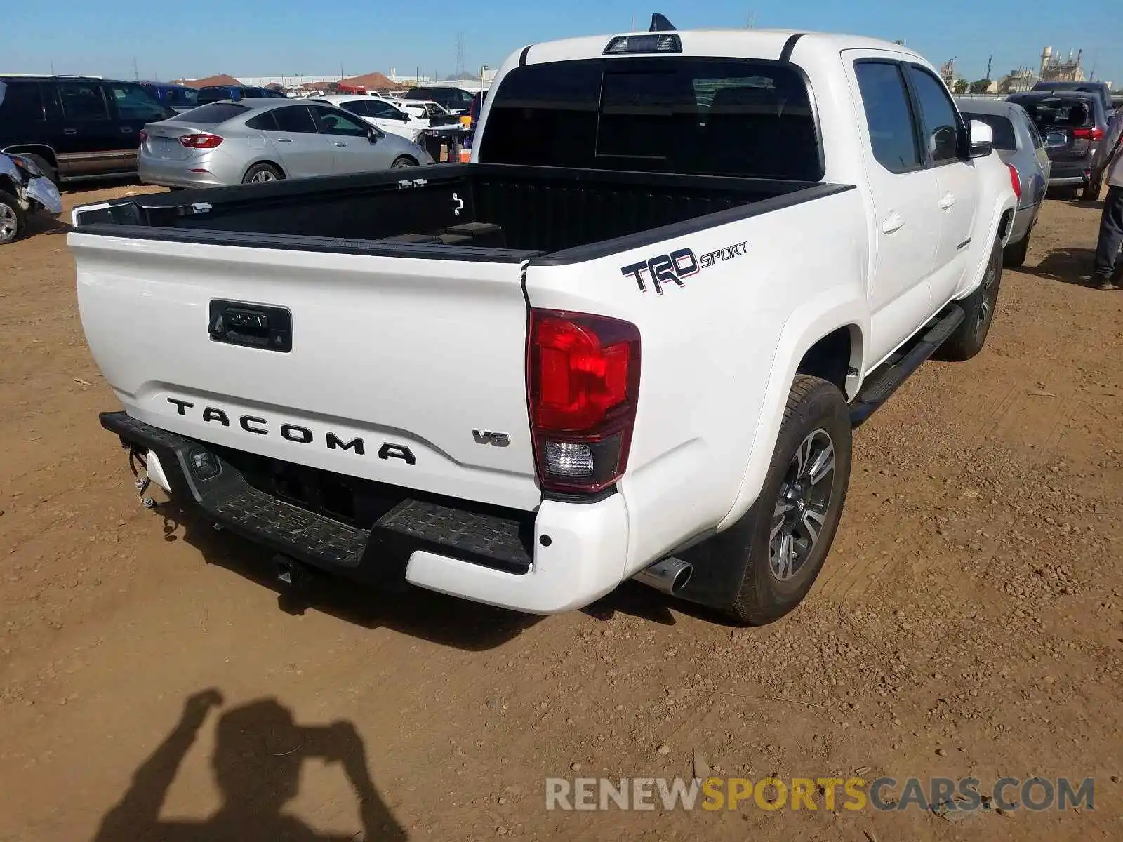 4 Photograph of a damaged car 3TMAZ5CN8KM113323 TOYOTA TACOMA 2019