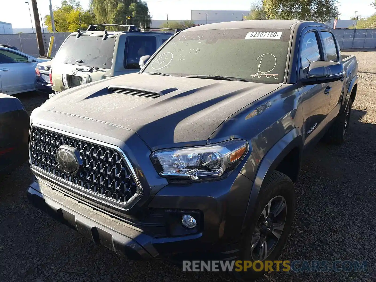 2 Photograph of a damaged car 3TMAZ5CN8KM113466 TOYOTA TACOMA 2019