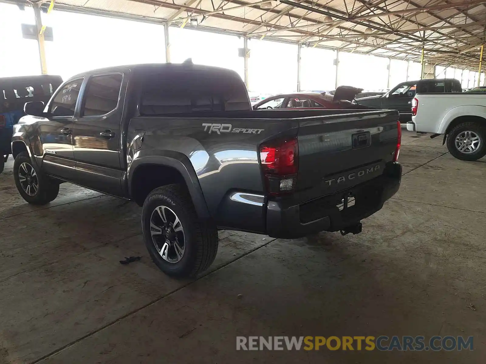 3 Photograph of a damaged car 3TMAZ5CN8KM113466 TOYOTA TACOMA 2019