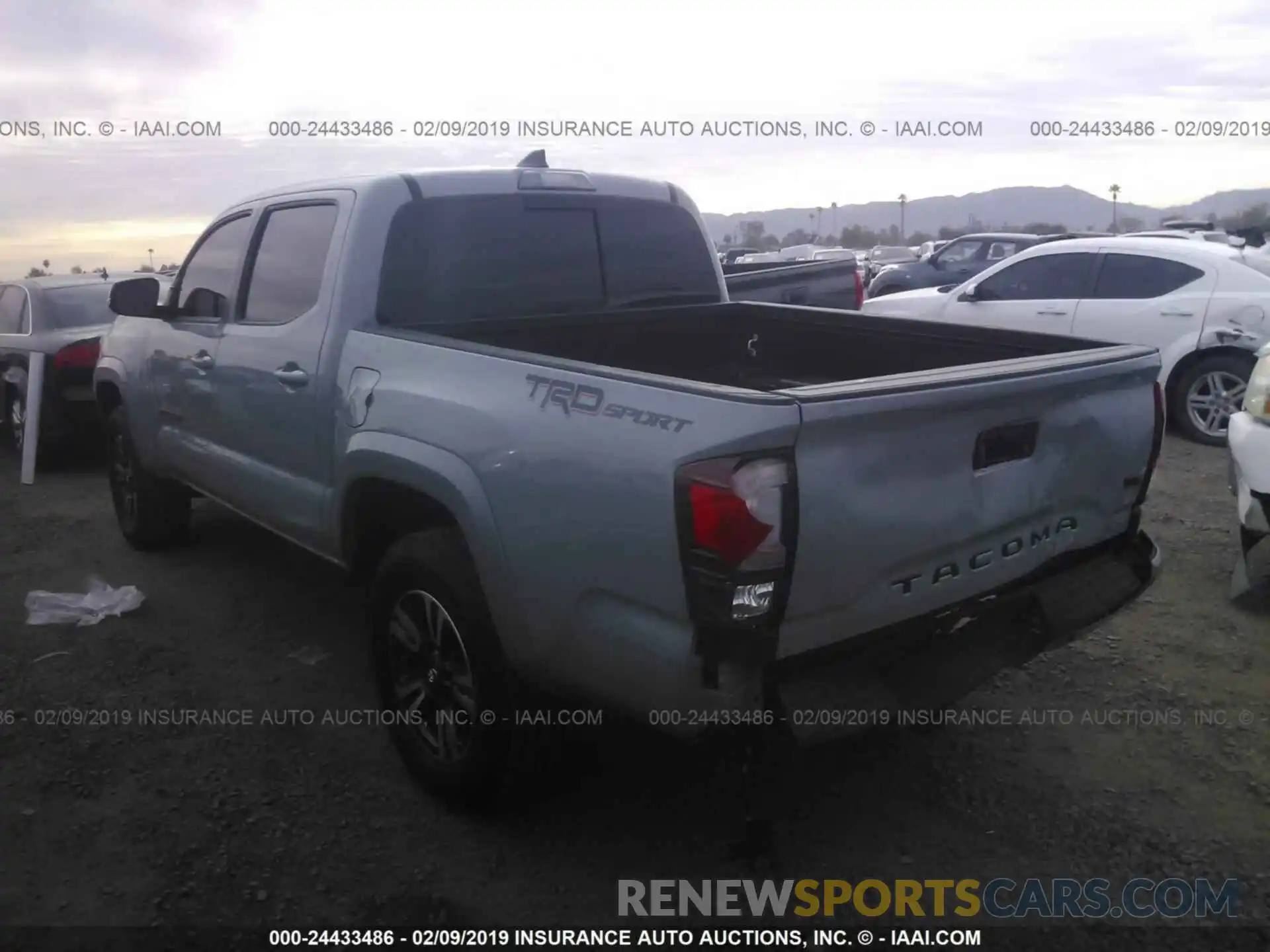 3 Photograph of a damaged car 3TMAZ5CN9KM080106 TOYOTA TACOMA 2019