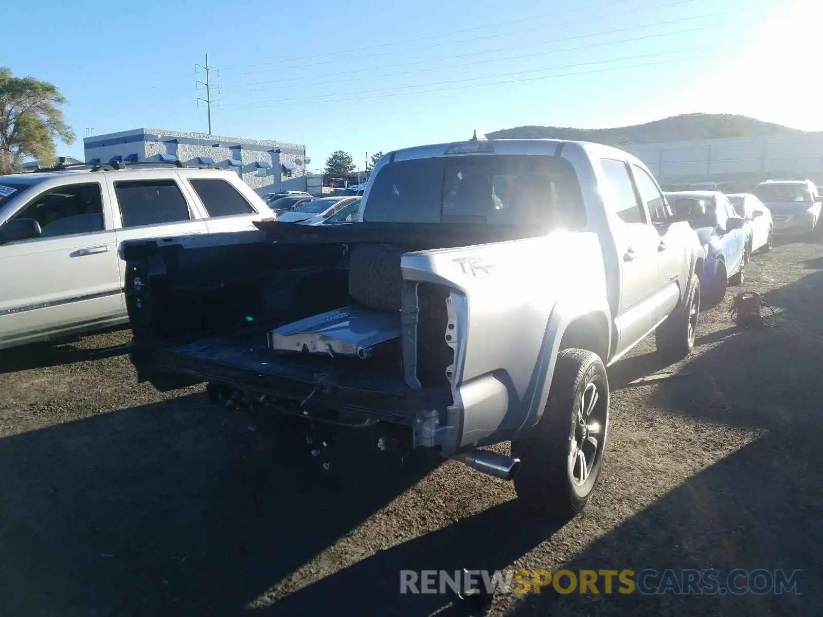 4 Photograph of a damaged car 3TMAZ5CN9KM089405 TOYOTA TACOMA 2019