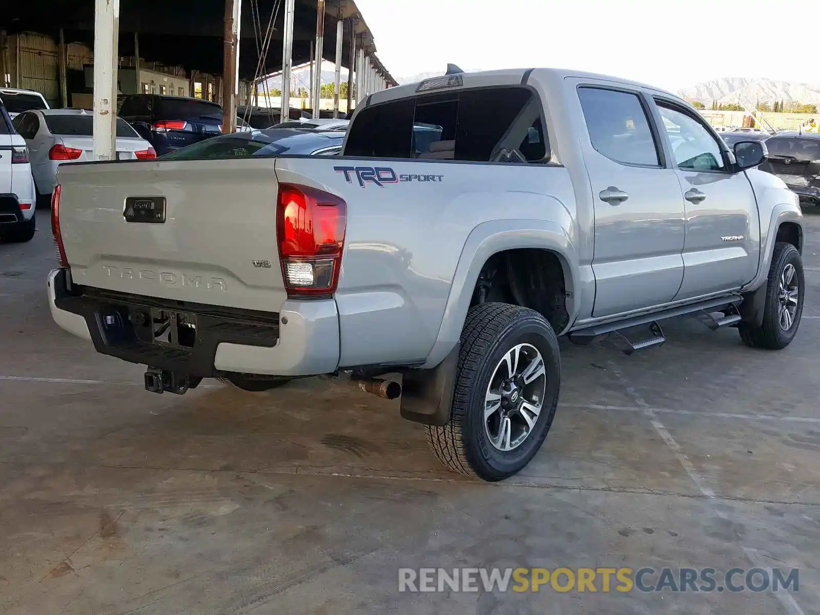 4 Photograph of a damaged car 3TMAZ5CN9KM089761 TOYOTA TACOMA 2019