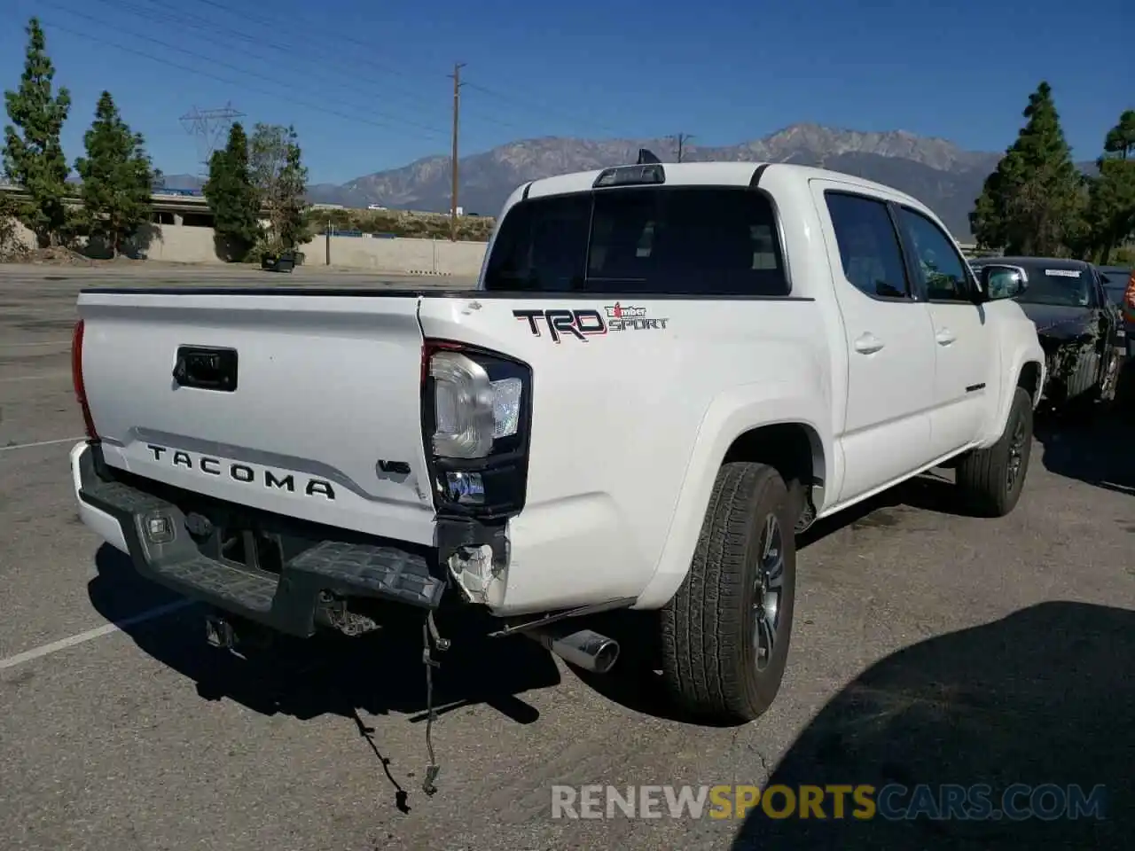 4 Photograph of a damaged car 3TMAZ5CN9KM090585 TOYOTA TACOMA 2019