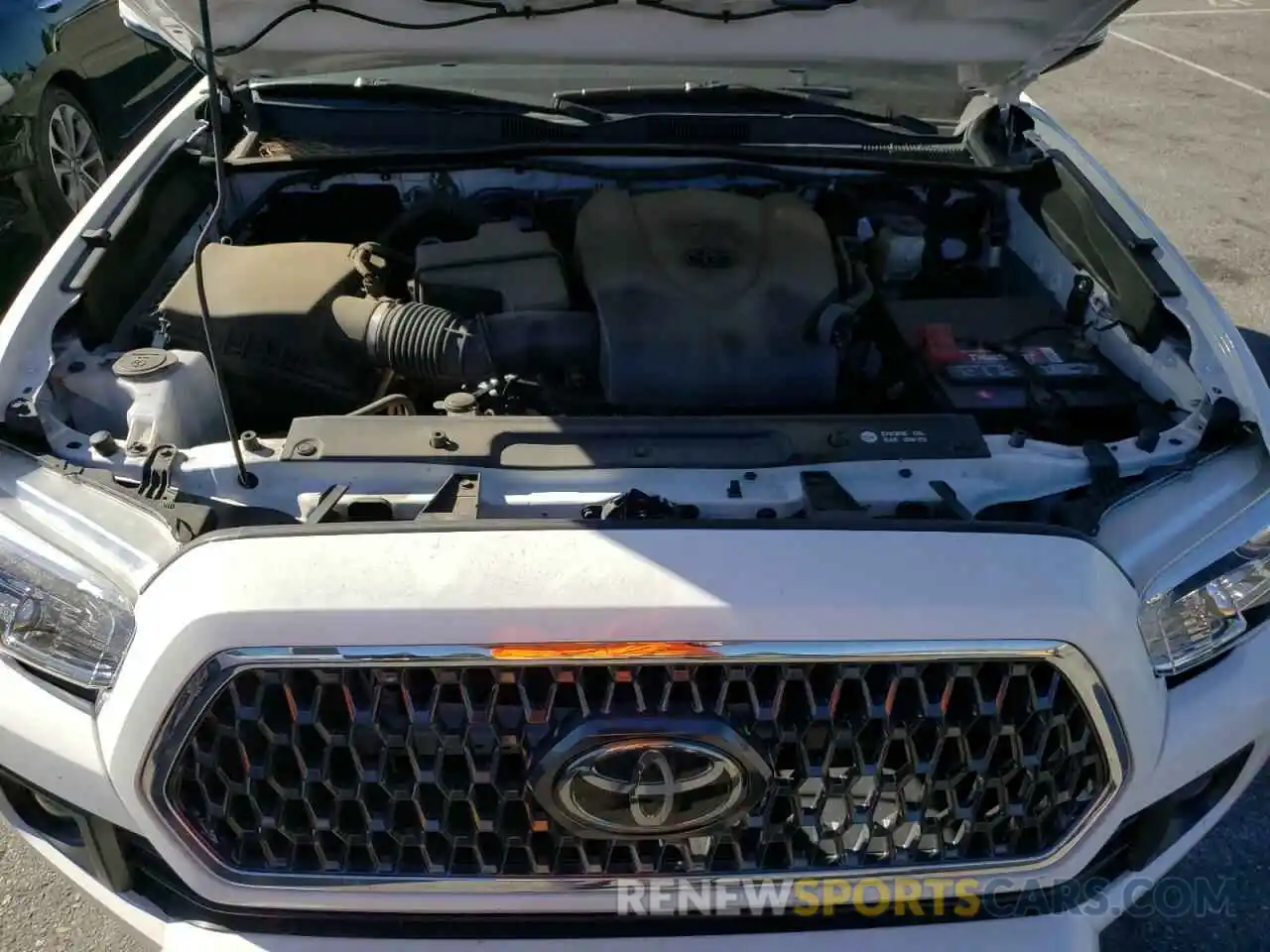 7 Photograph of a damaged car 3TMAZ5CN9KM090585 TOYOTA TACOMA 2019