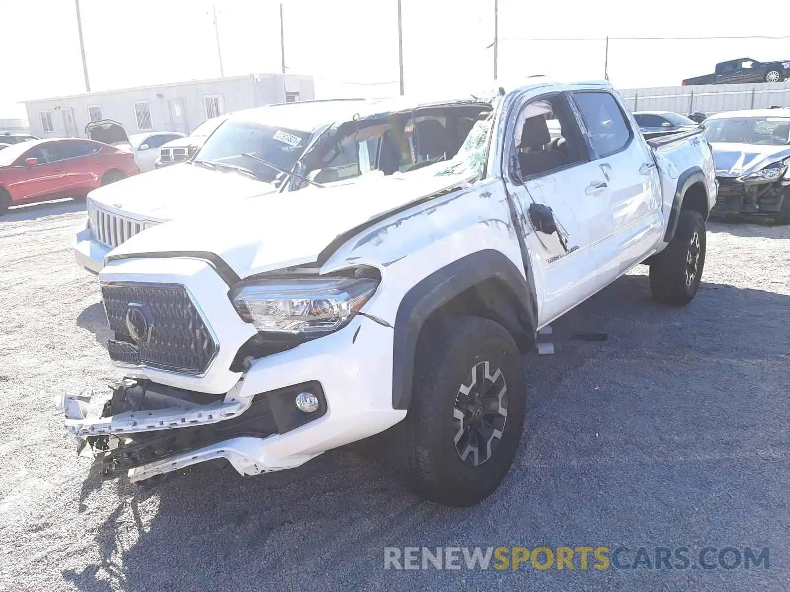 2 Photograph of a damaged car 3TMAZ5CN9KM092241 TOYOTA TACOMA 2019