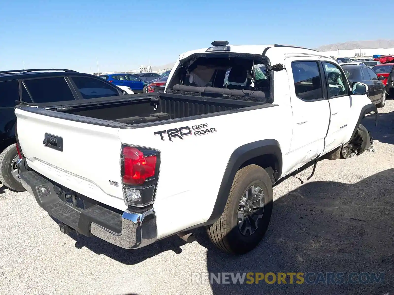 4 Photograph of a damaged car 3TMAZ5CN9KM092241 TOYOTA TACOMA 2019