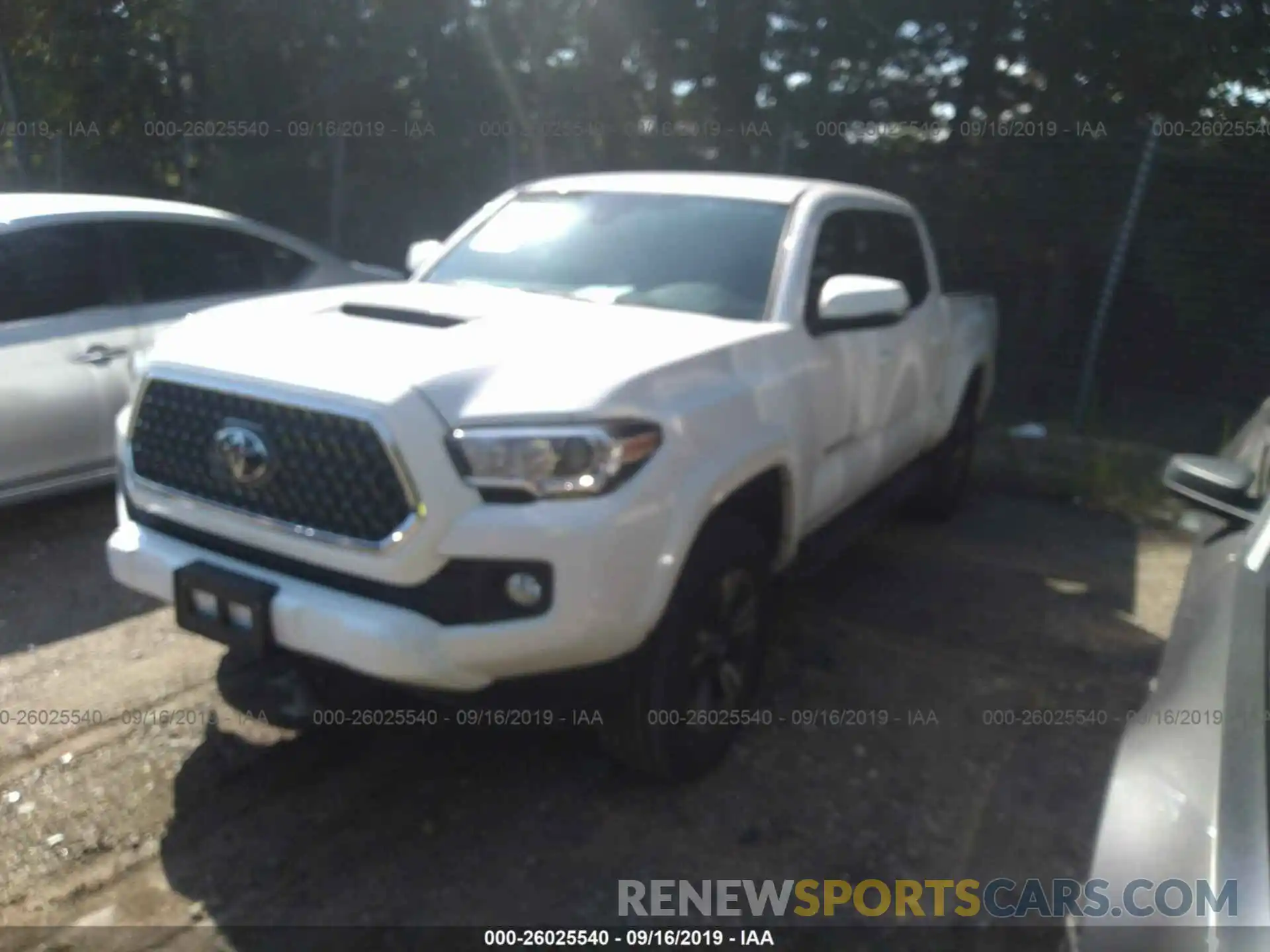 2 Photograph of a damaged car 3TMAZ5CN9KM093583 TOYOTA TACOMA 2019