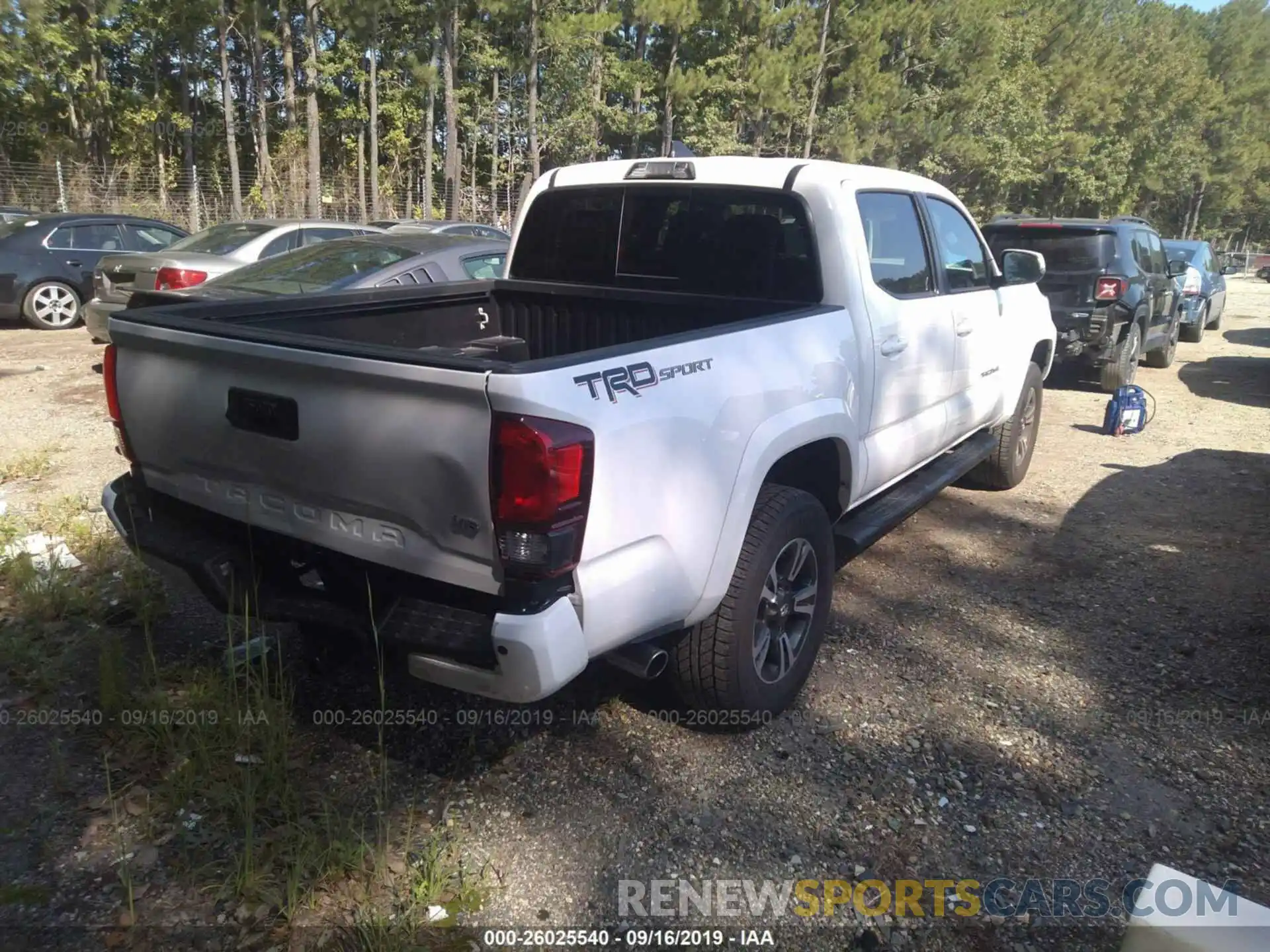 4 Photograph of a damaged car 3TMAZ5CN9KM093583 TOYOTA TACOMA 2019