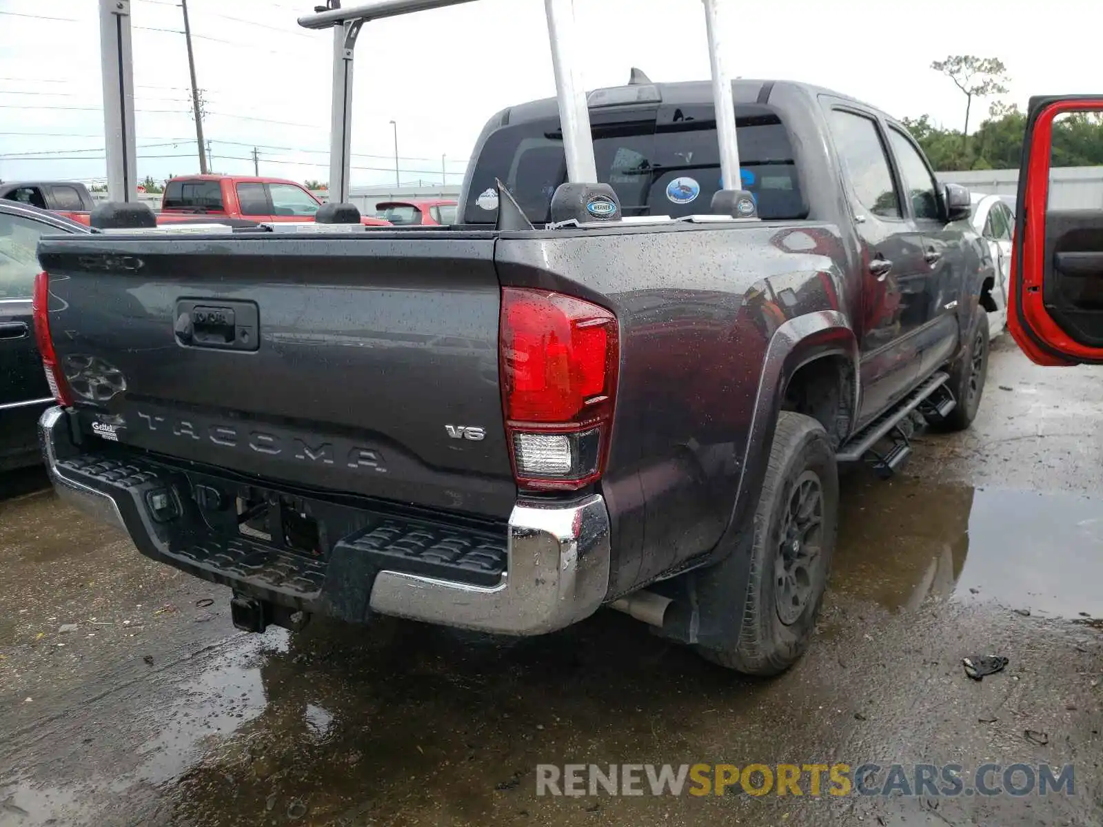 4 Photograph of a damaged car 3TMAZ5CN9KM094930 TOYOTA TACOMA 2019