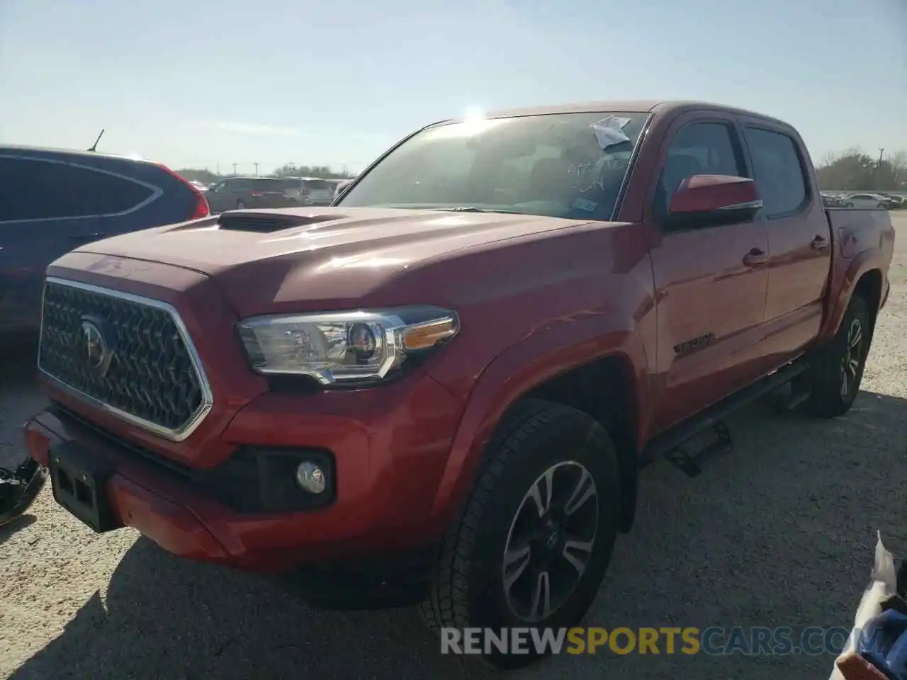 2 Photograph of a damaged car 3TMAZ5CN9KM094975 TOYOTA TACOMA 2019