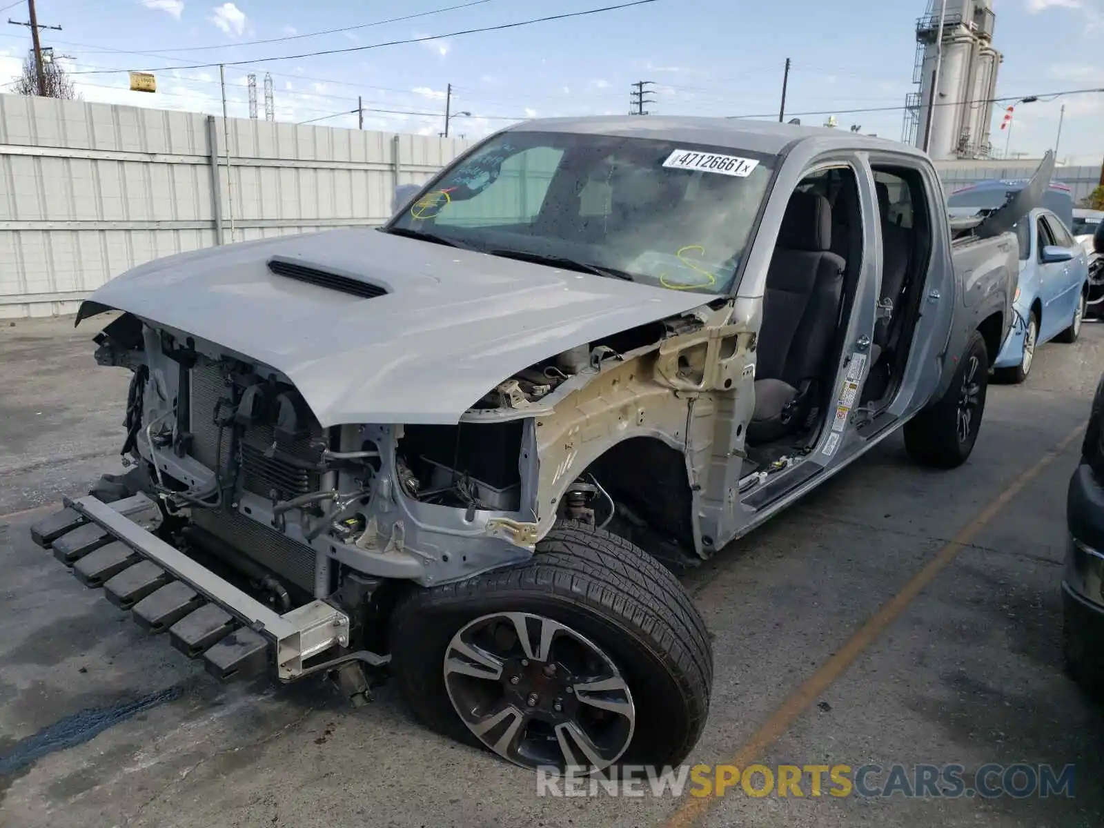 2 Photograph of a damaged car 3TMAZ5CN9KM095320 TOYOTA TACOMA 2019