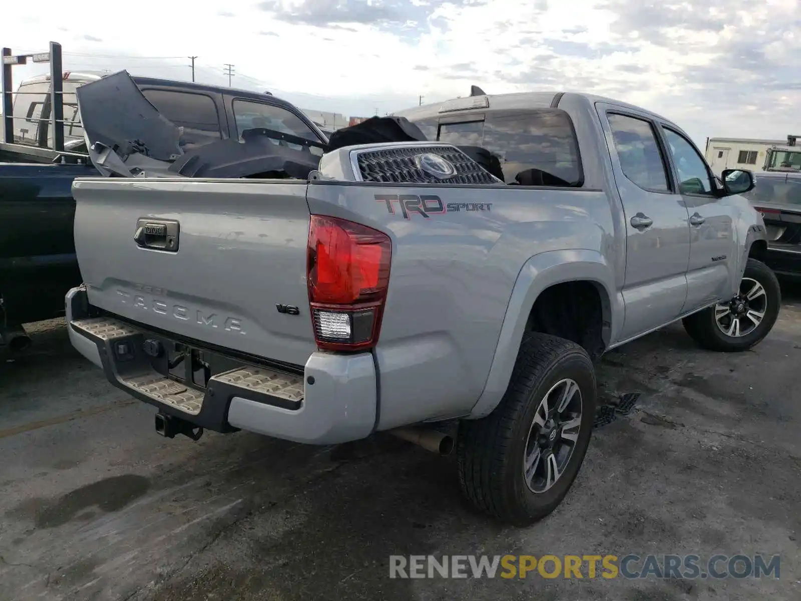 4 Photograph of a damaged car 3TMAZ5CN9KM095320 TOYOTA TACOMA 2019